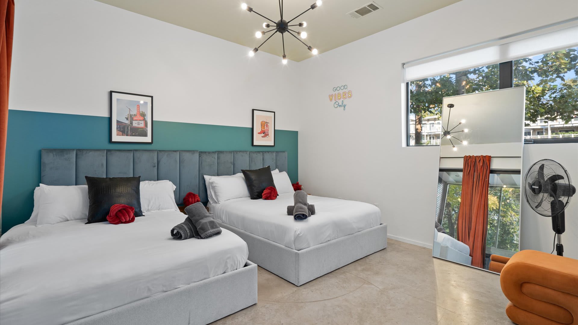 Modern Room With Two Cozy Queen Beds And Natural Light