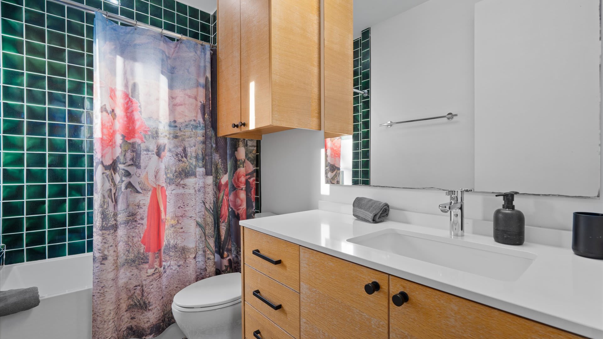 Stylish Bath With A Pop Of Color And Elegant Storage Space