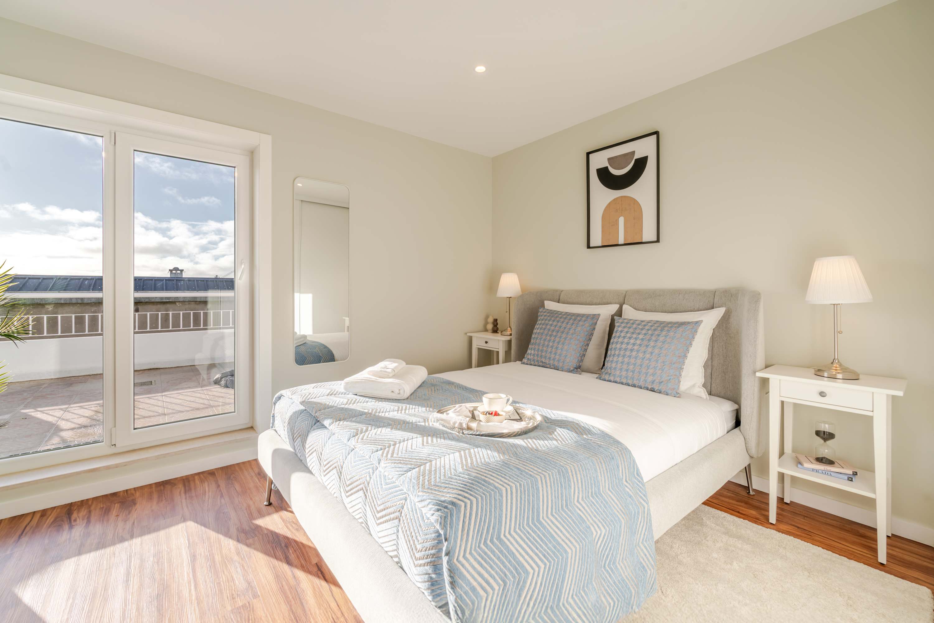 Bright Beachside Flat with Terrace by HostWise