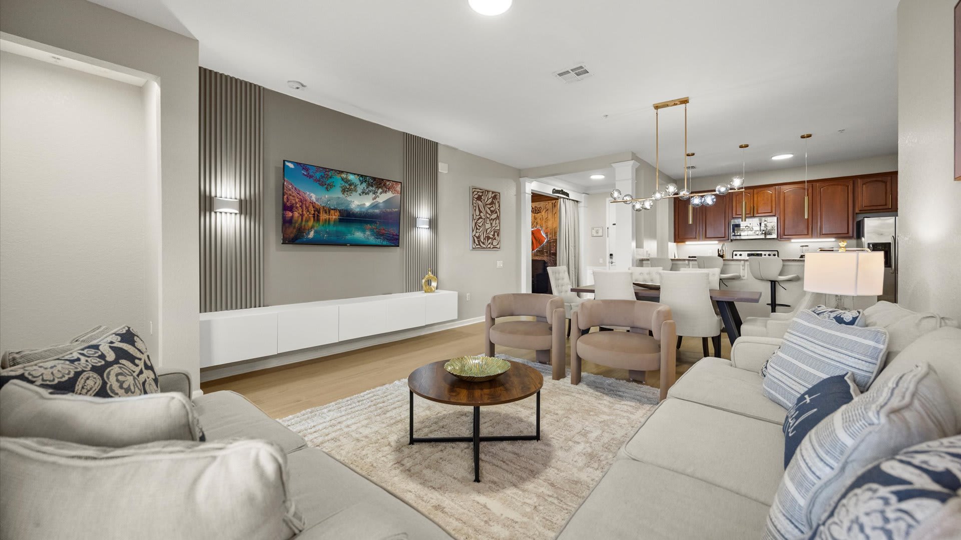 Modern Living Room Retreat – A bright, stylish lounge with plush seating and a large Smart TV for relaxing nights in.