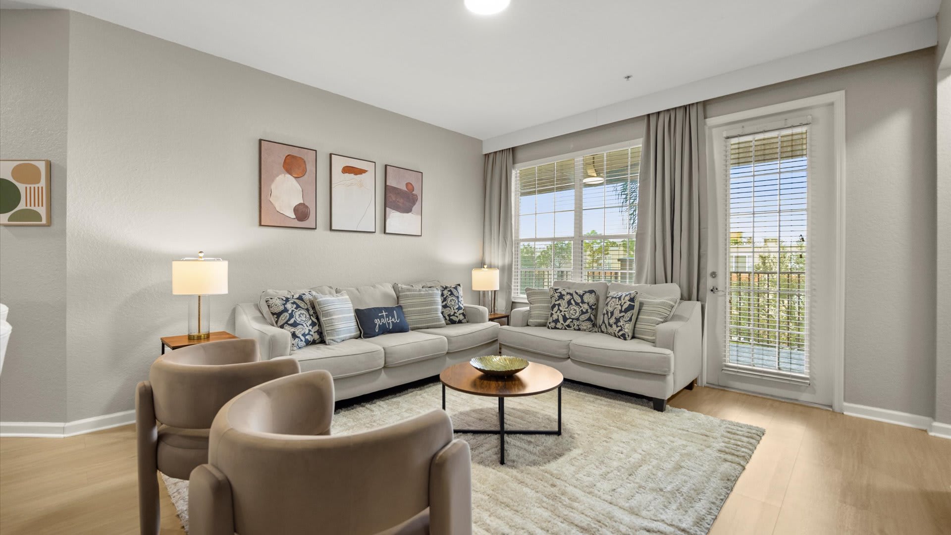 Modern Living Room Retreat – A bright, stylish lounge with plush seating and a large Smart TV for relaxing nights in.