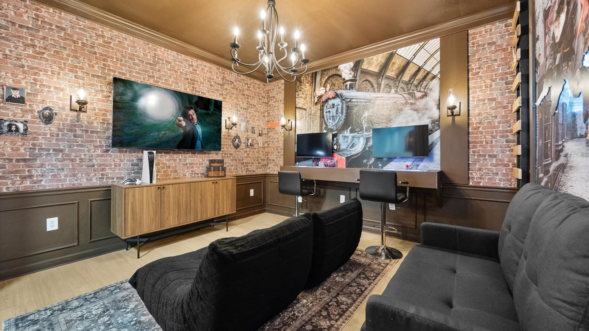 Rustic Hogwarts Game & Media Lounge – Brick walls, dual TVs, and comfy seating create the perfect hangout zone.