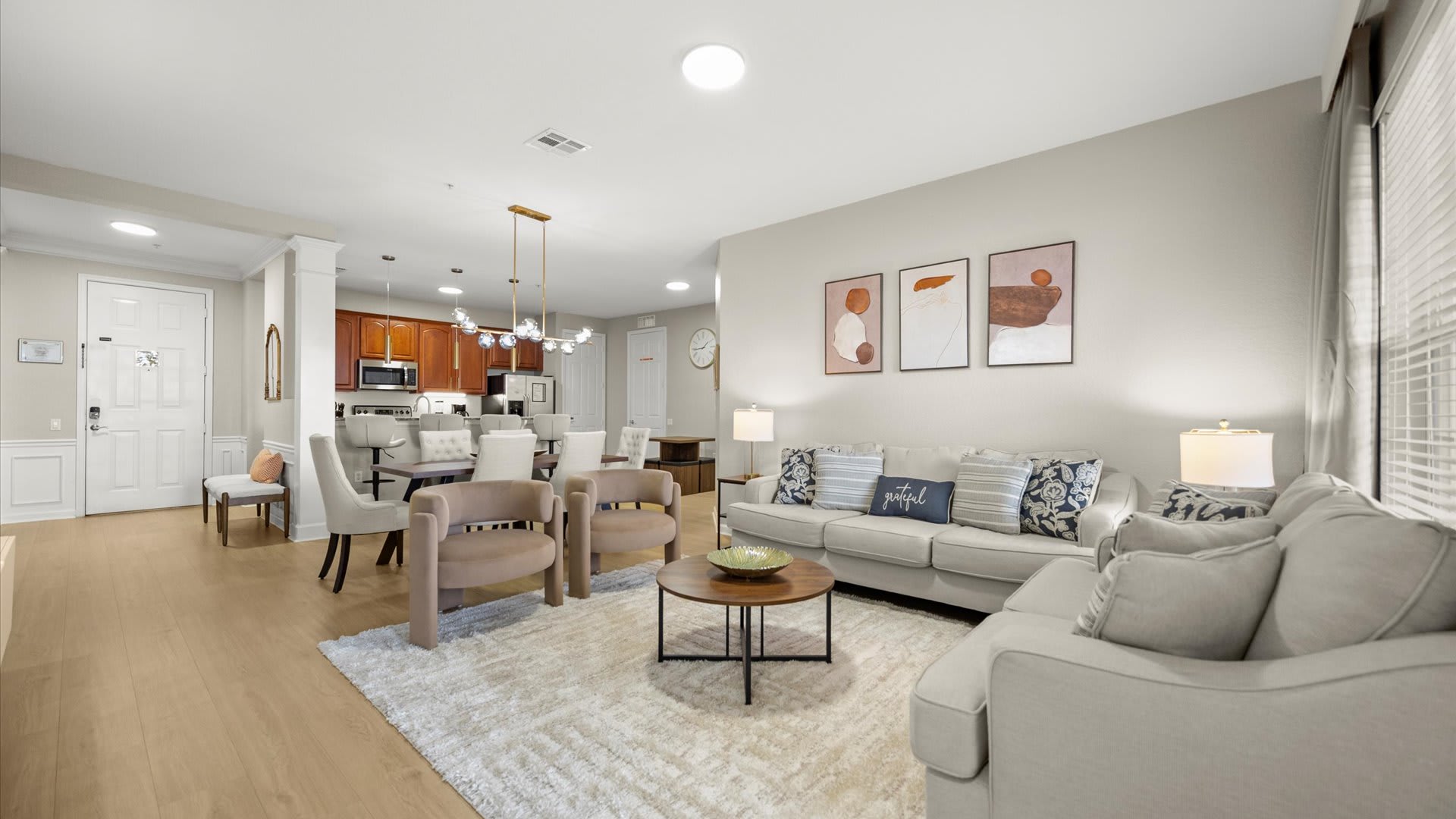 Modern Living Room Retreat – A bright, stylish lounge with plush seating and a large Smart TV for relaxing nights in.