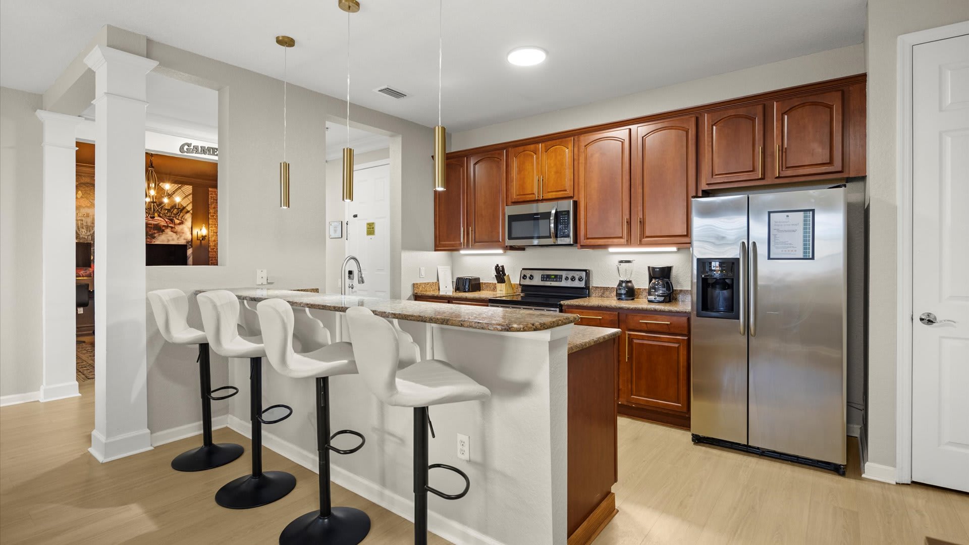 Open Kitchen & Living Layout – Perfect for socializing while meals are prepared.