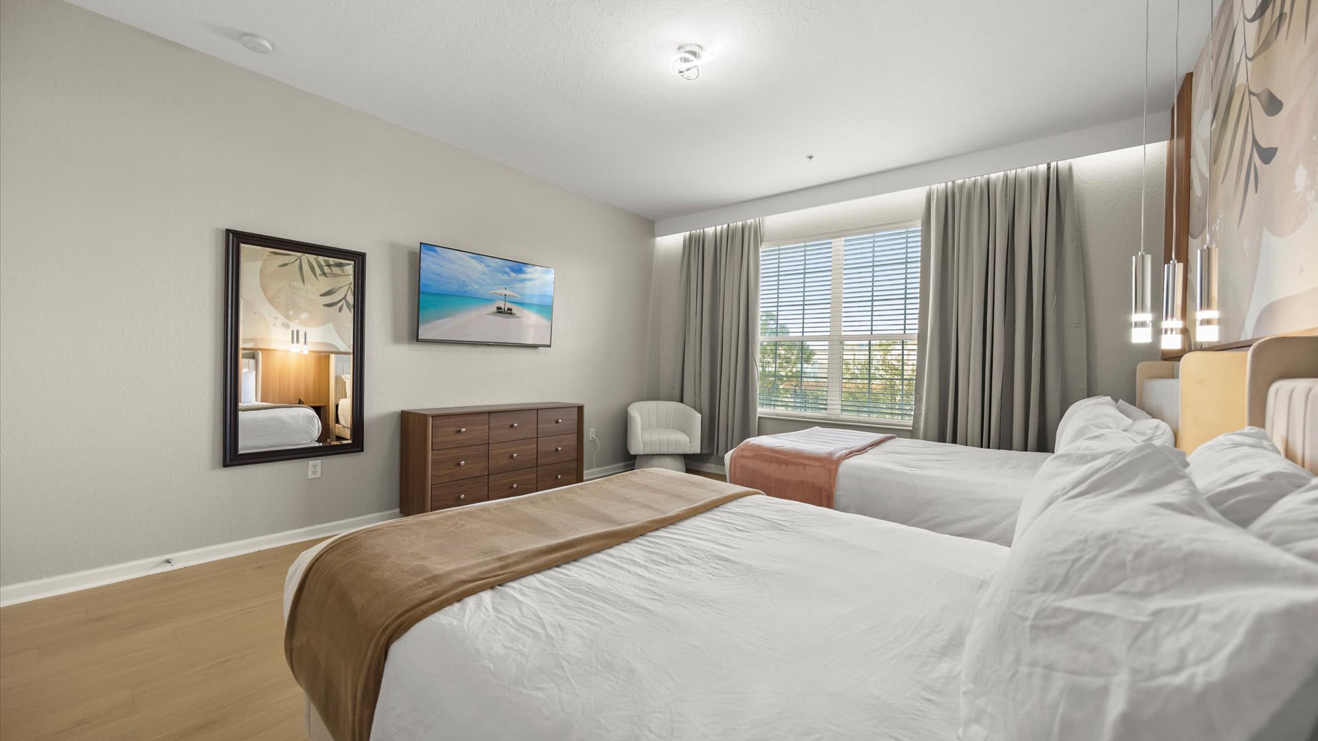 Twin Double Bedroom with Warm Tones – Ideal for kids or friends sharing a room.