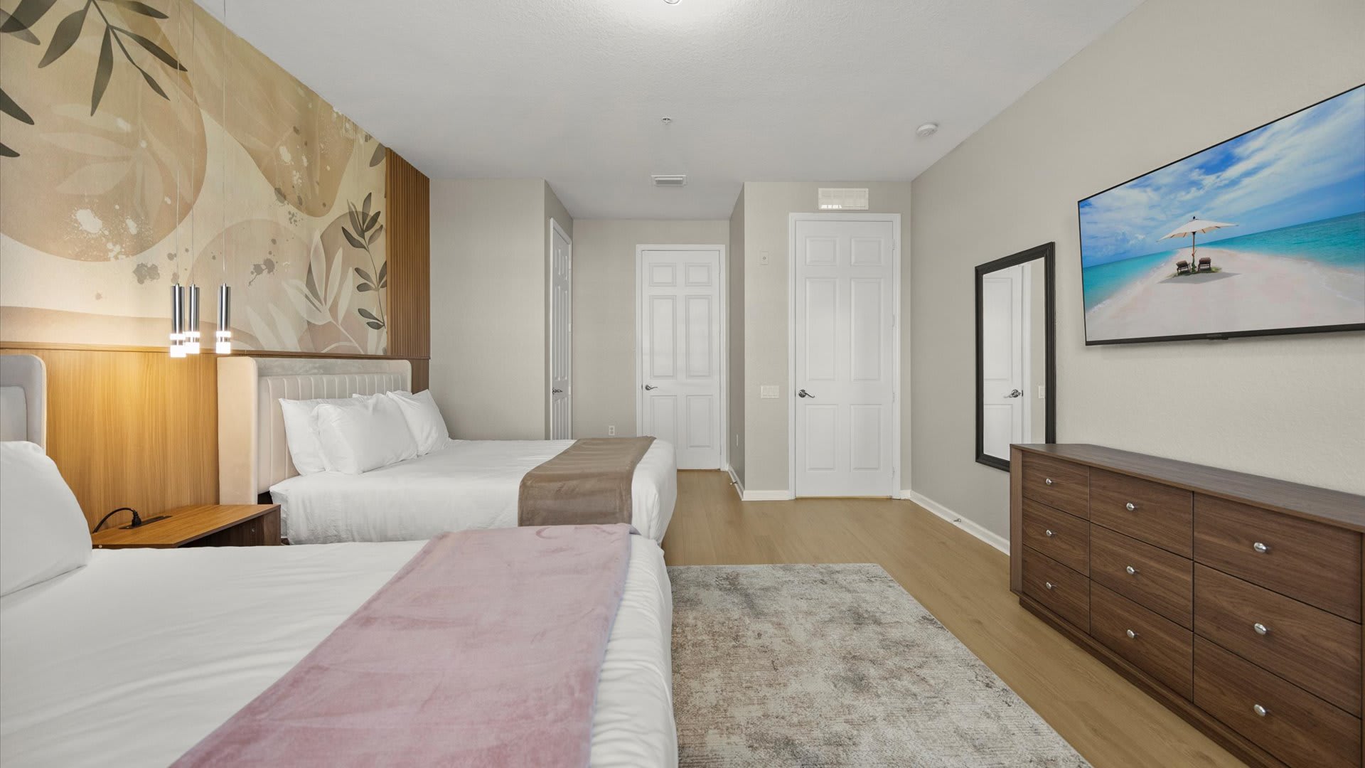 Twin Double Bedroom with Warm Tones – Ideal for kids or friends sharing a room.