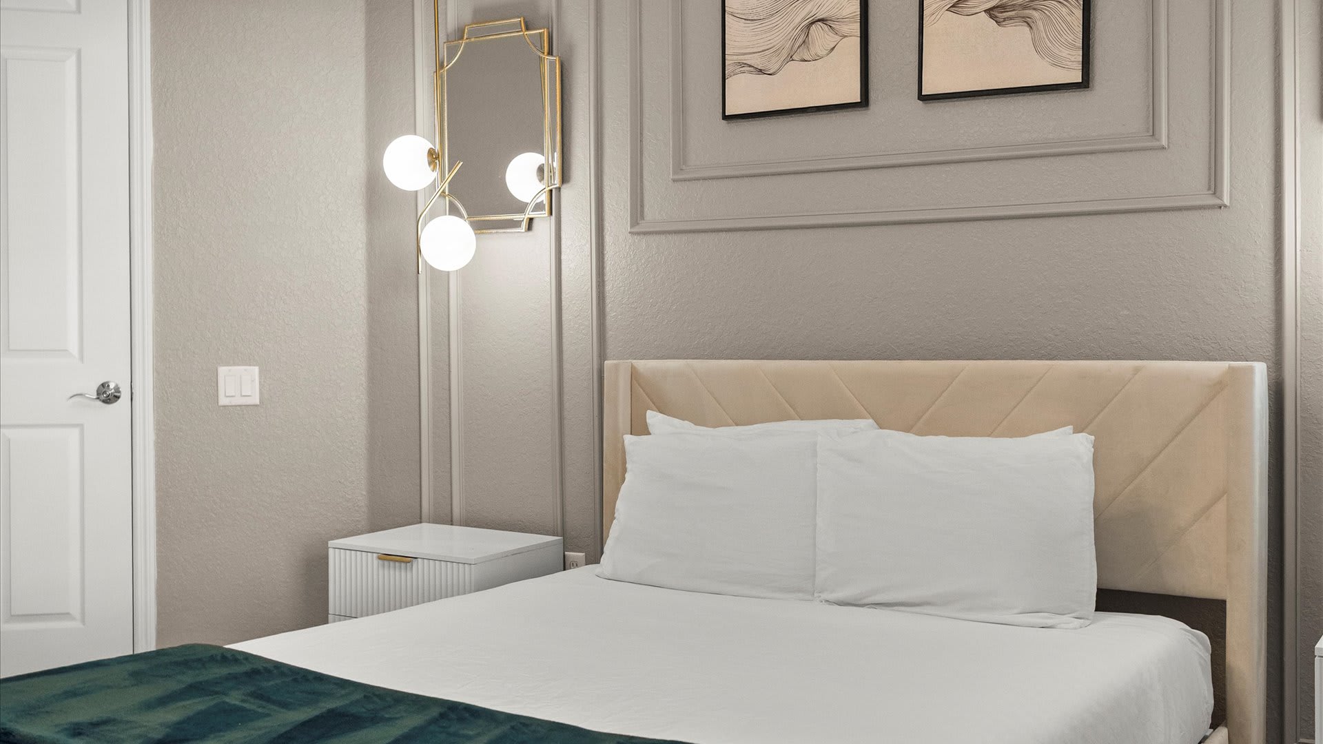 Elegant Queen Bedroom – Soft lighting and calming décor make this room a peaceful place to unwind.