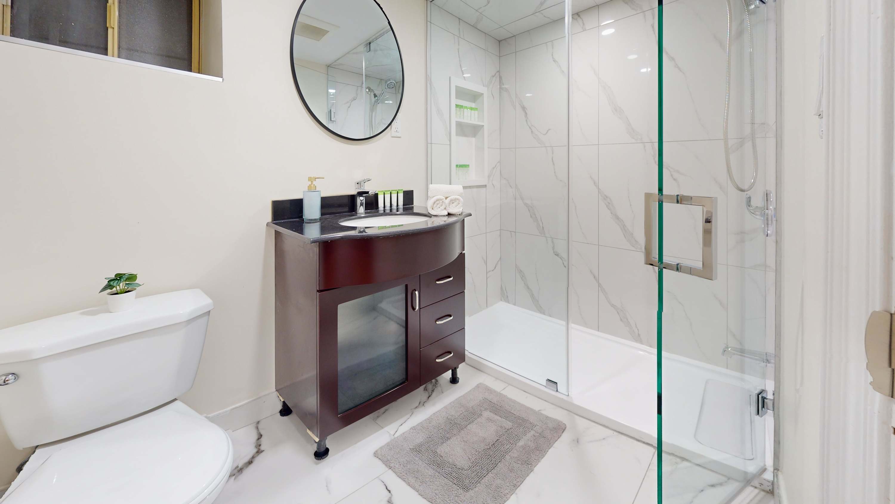Stylish Bathroom with Walk-In Glass Shower
