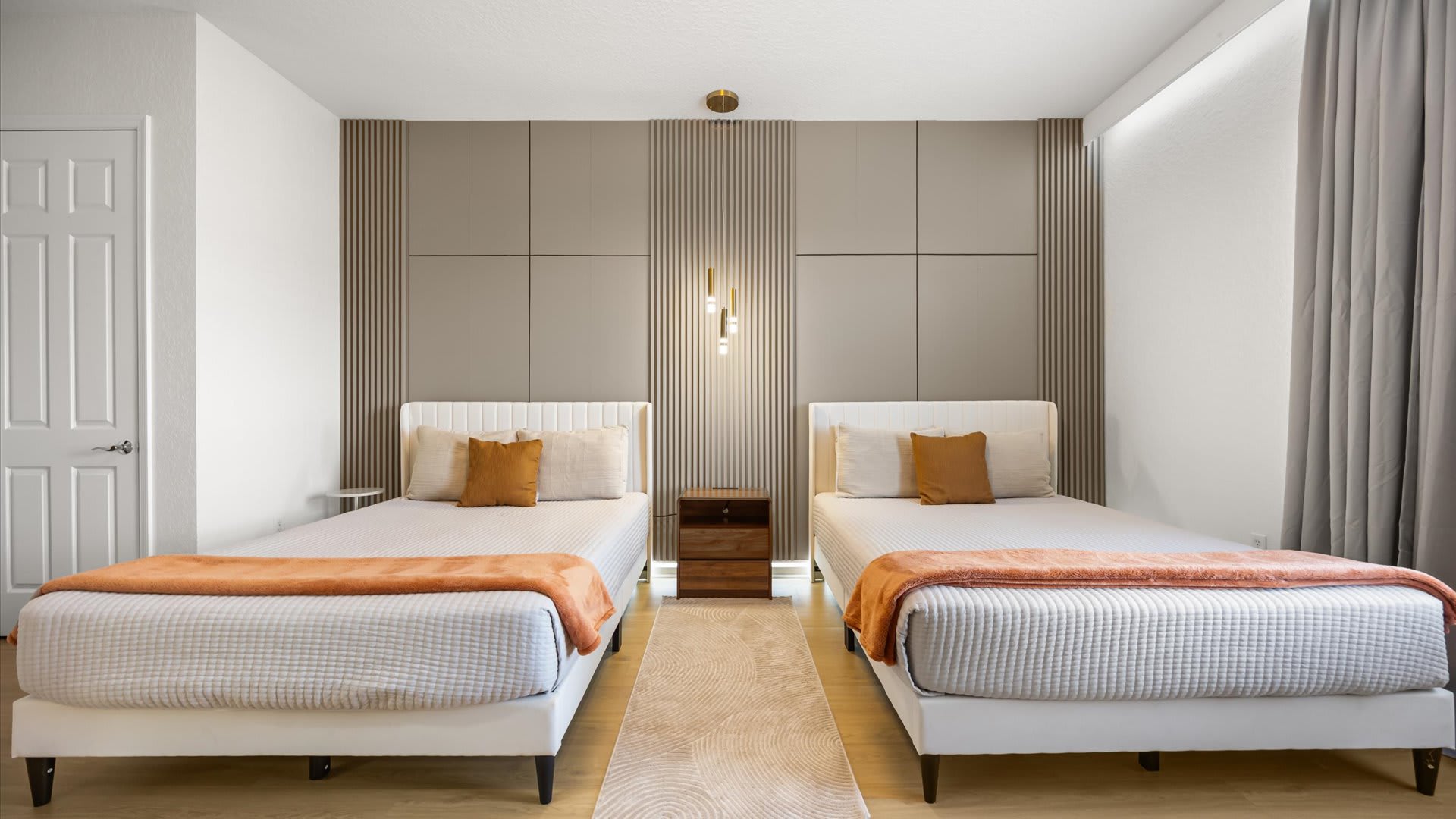 Elegant twin double bedroom with en-suite and smart TV