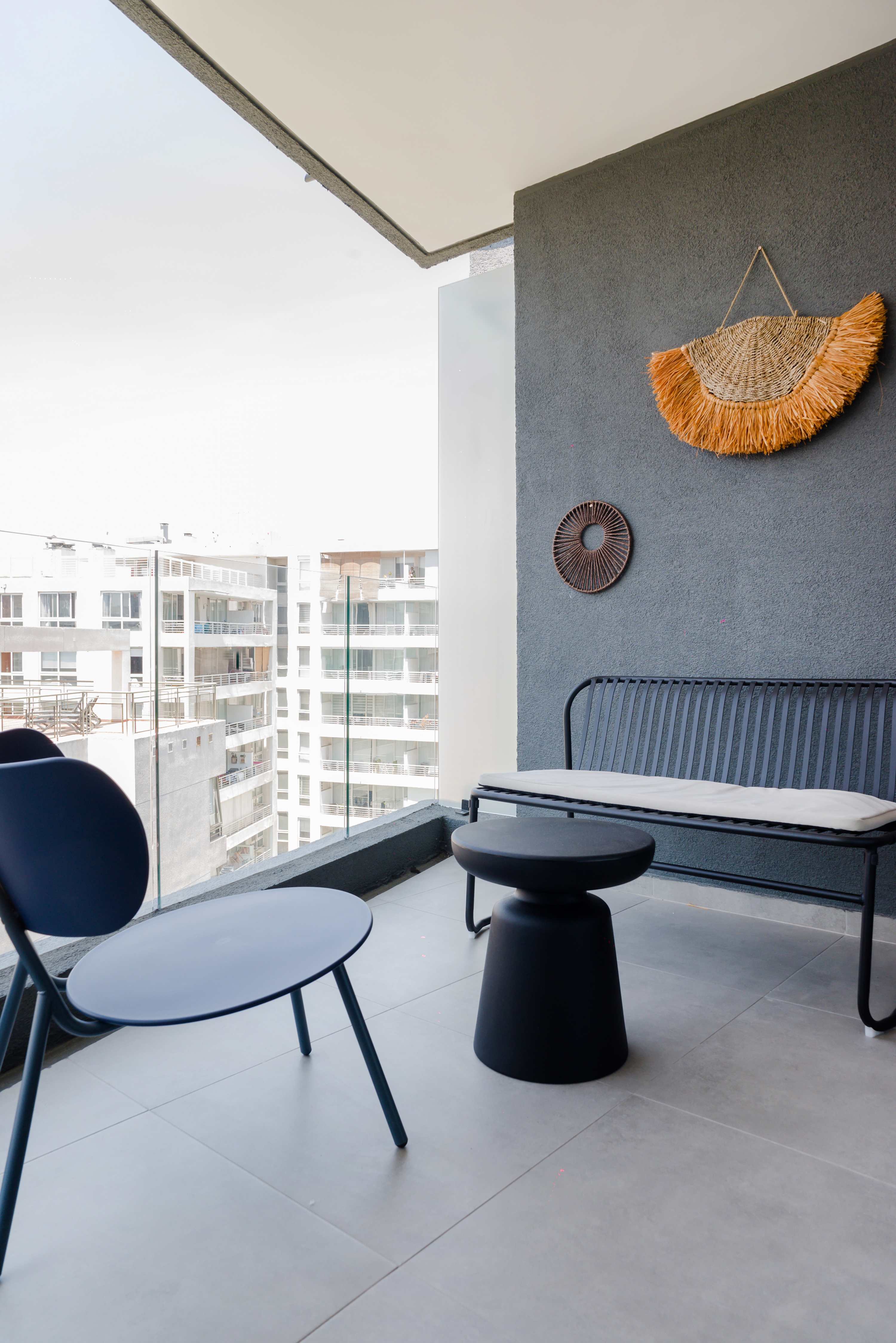 Relax on the stylish balcony with city views, perfect for enjoying a morning coffee or evening sunset.