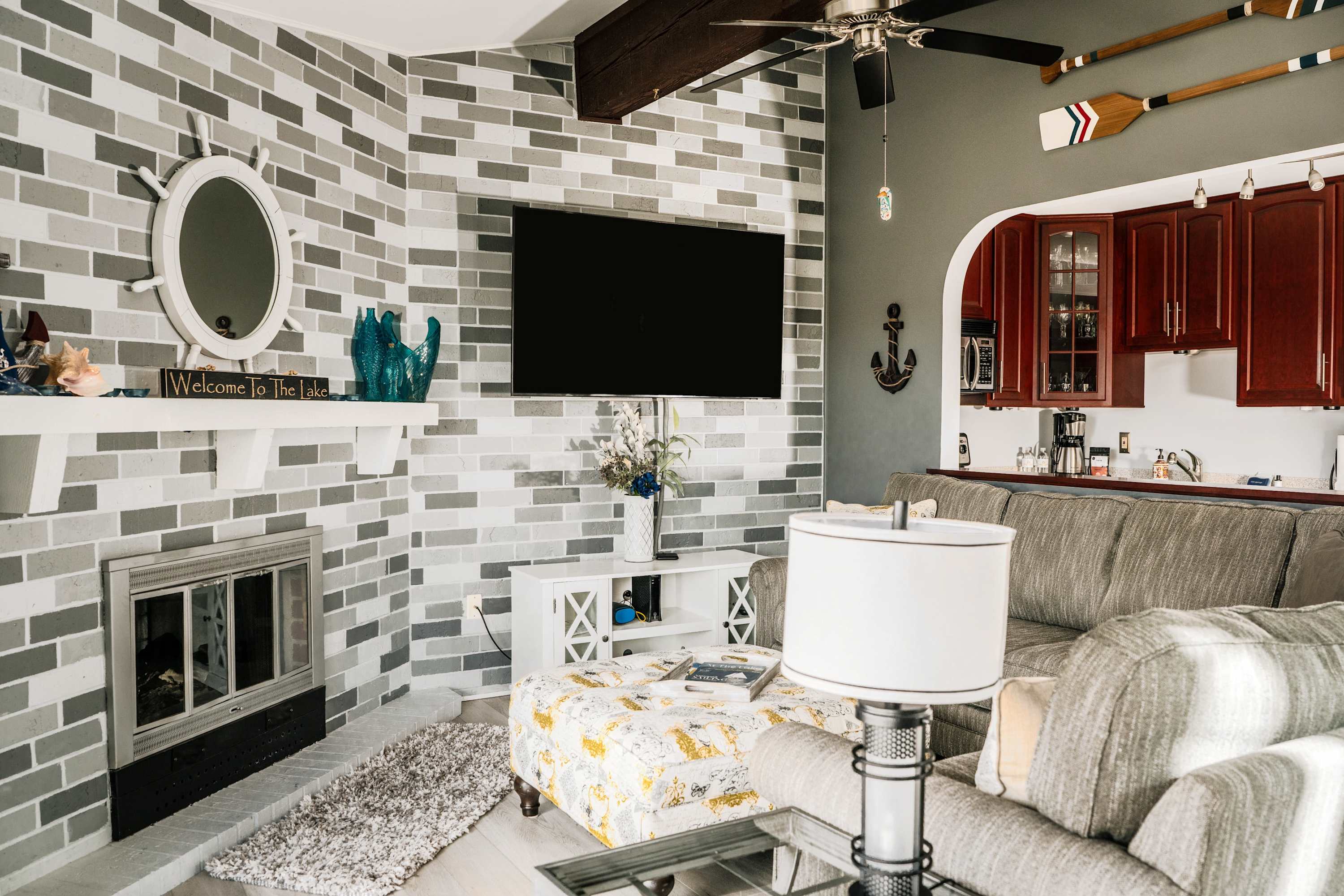 Relax in the living room with balcony access and a queen sleeper sofa!