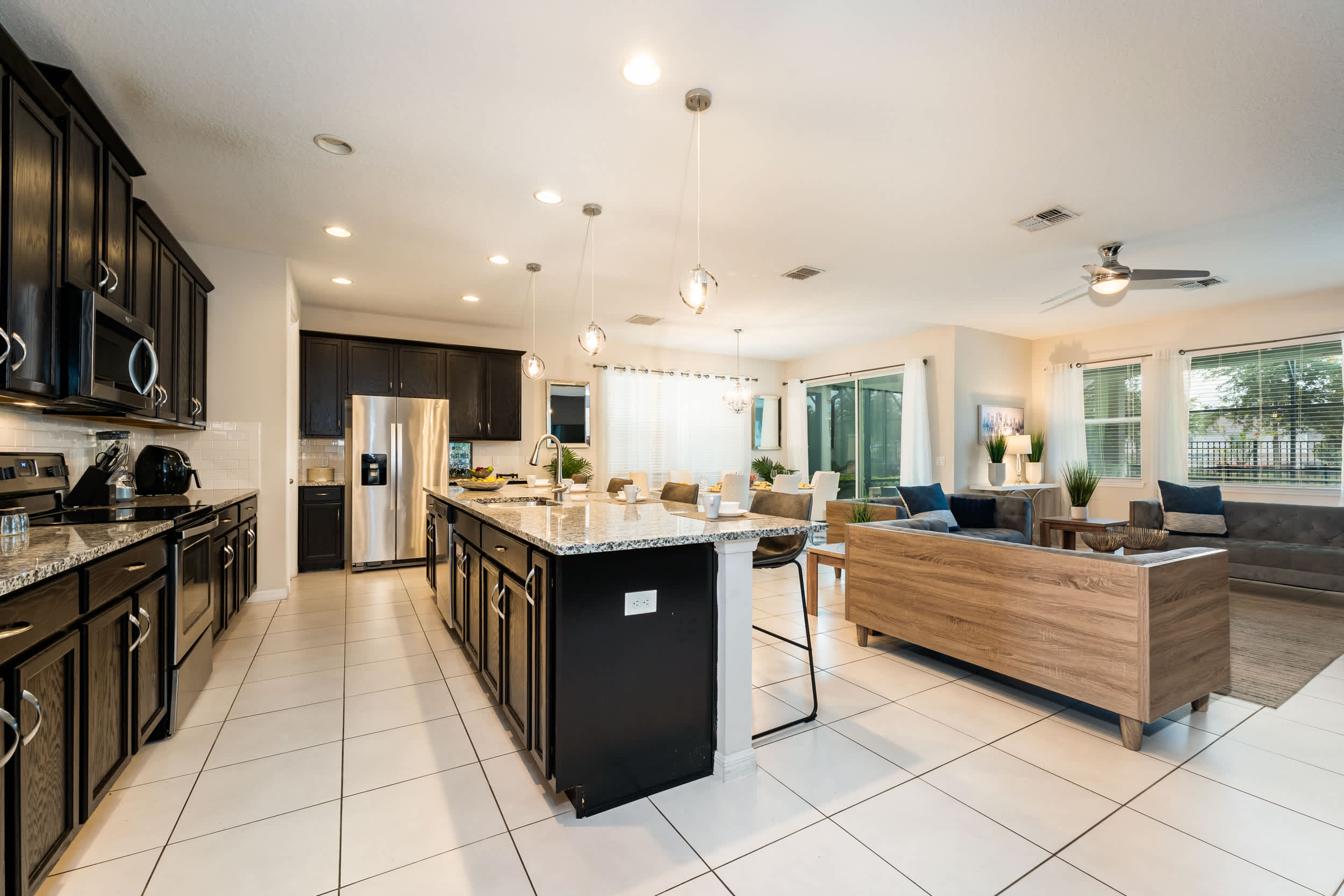 Luxuriate in this expansive kitchen and living area, ideal for entertaining and family gatherings in style.