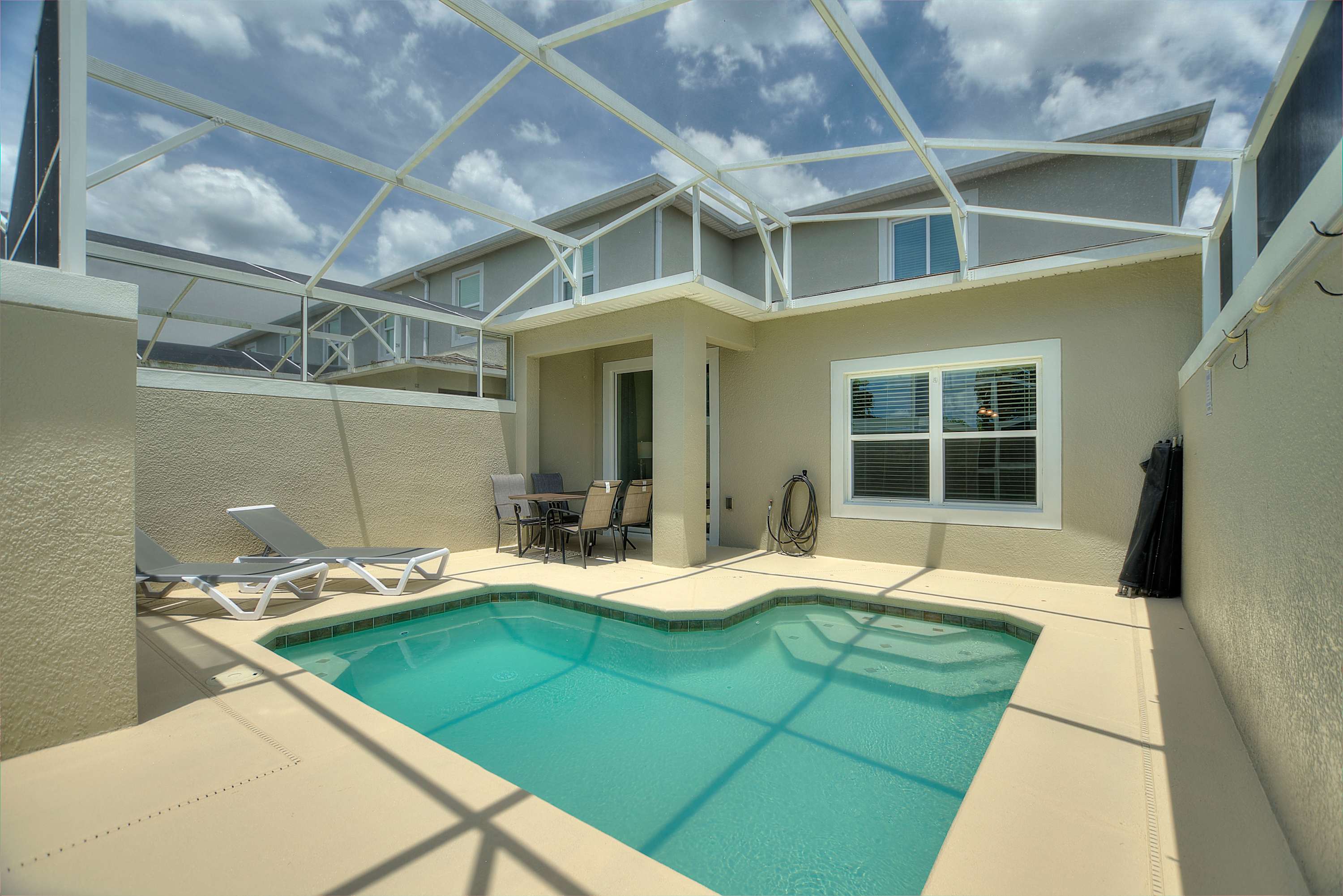 Take a dip in the private screened pool