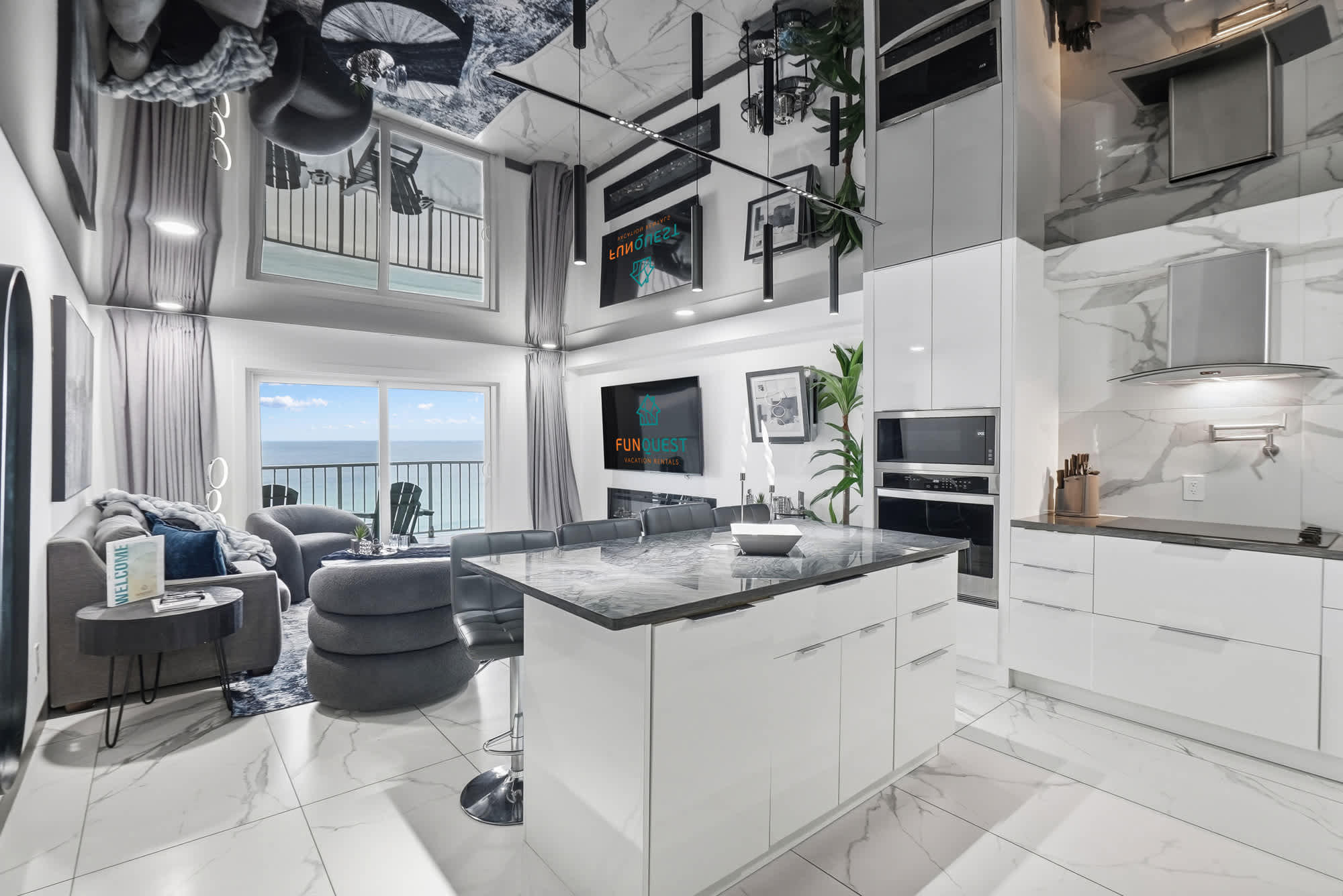 The Summit 1208 – Modern kitchen and living area with ocean view and sleek furnishings.