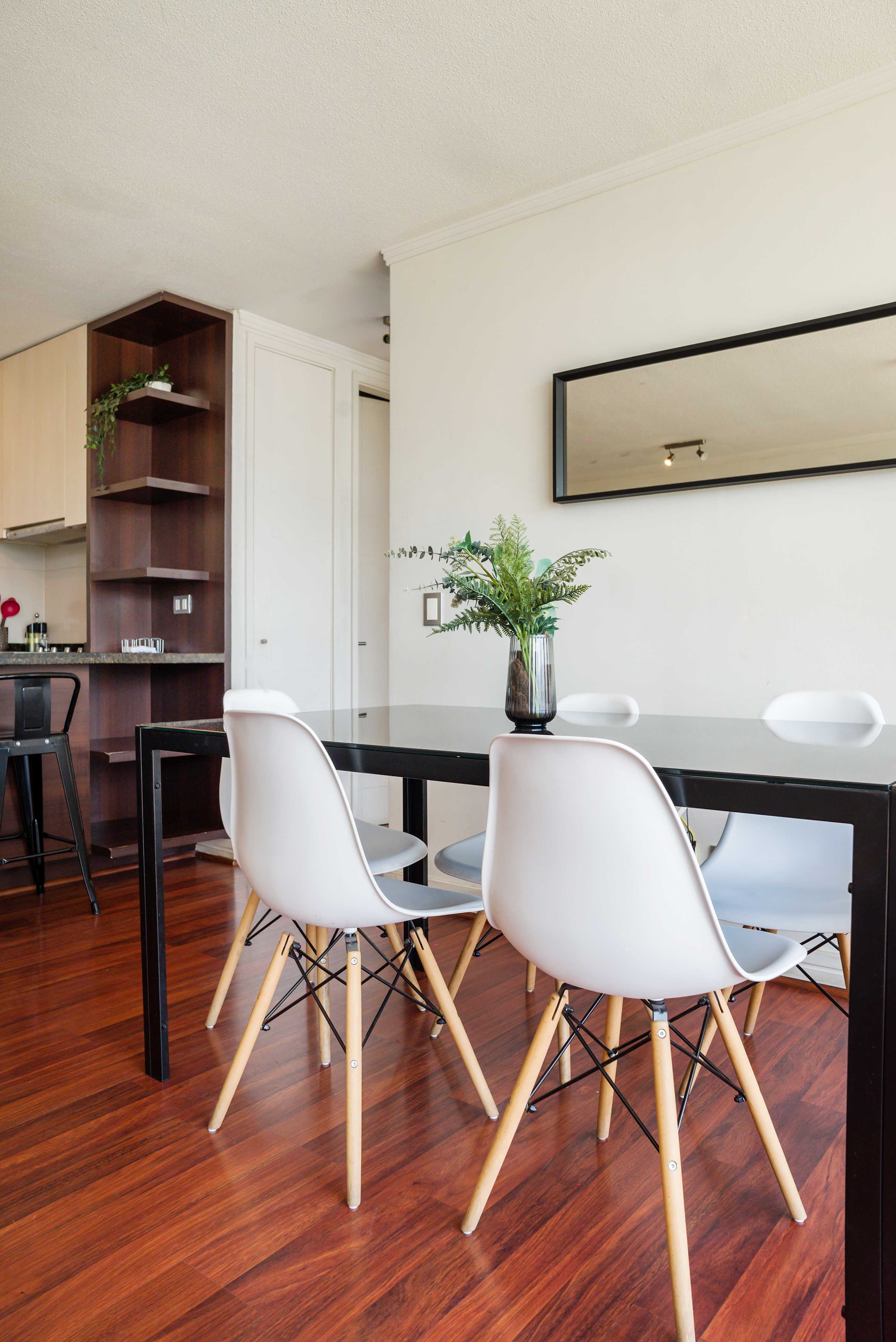 Stylish dining area with modern decor and ample seating, perfect for enjoying meals together.