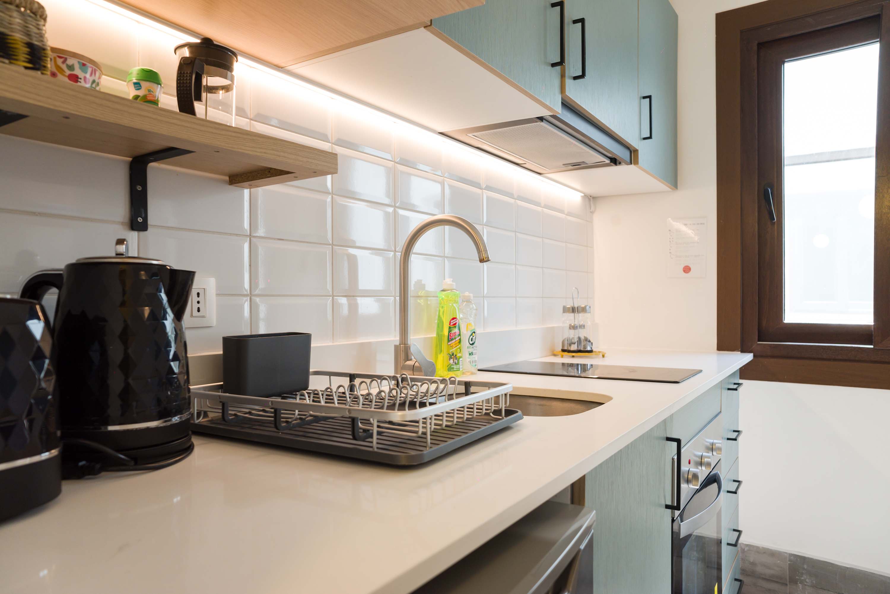Sleek and modern kitchen with all essentials for a cozy stay in the heart of Chile.