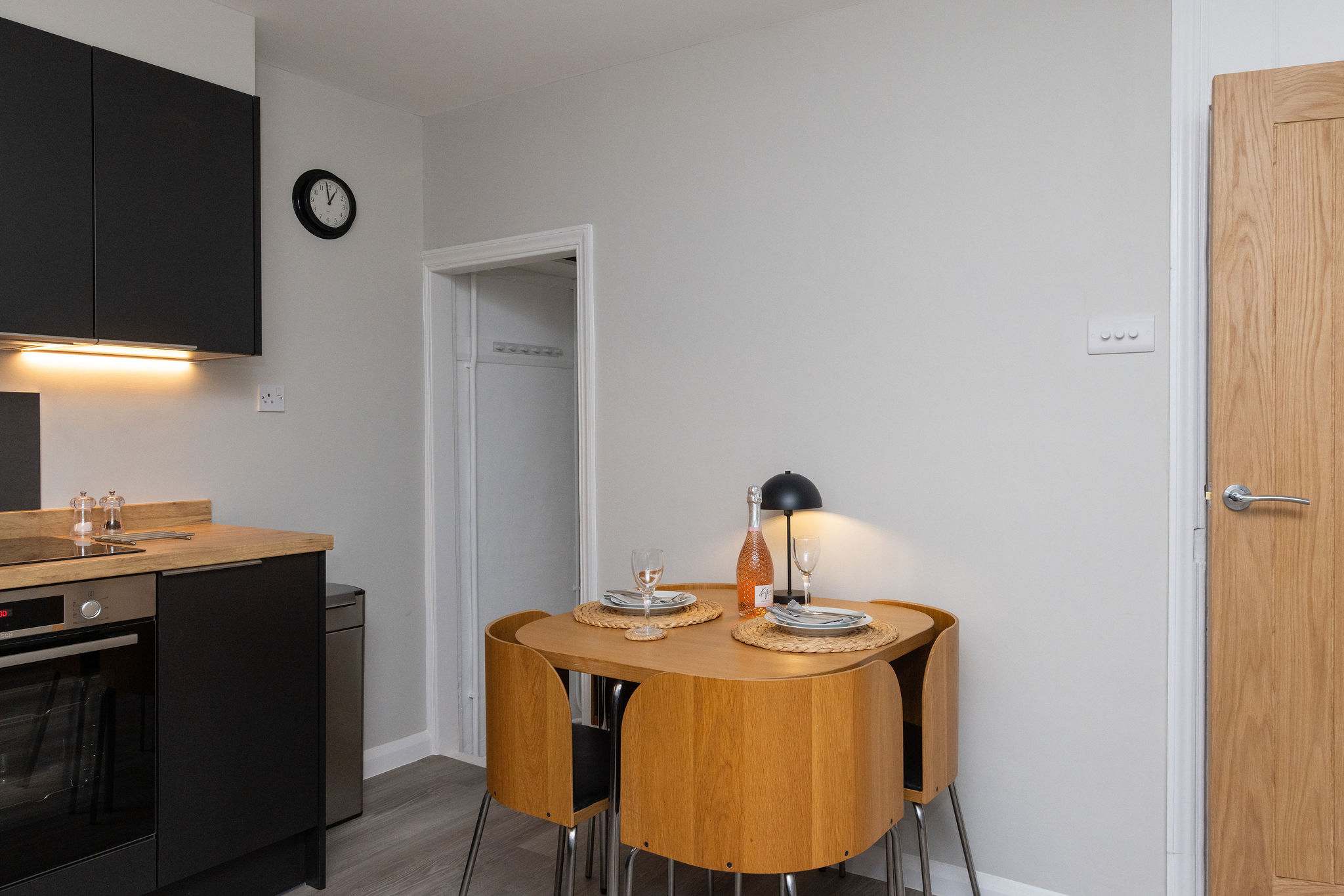 Sit down and enjoy your meals at this small table for 4 people.