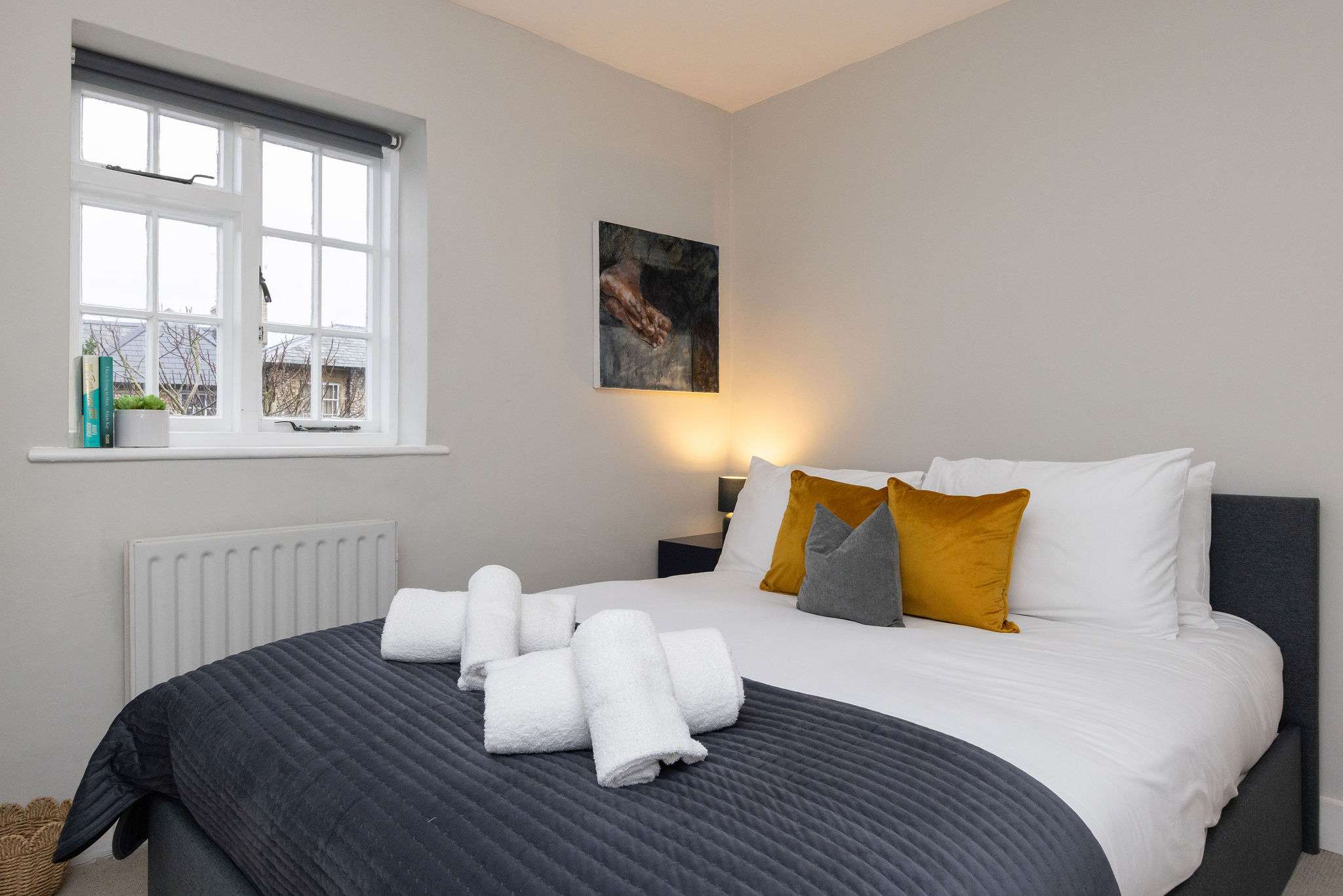 A beautifully designed small king bedroom offering comfort and style.