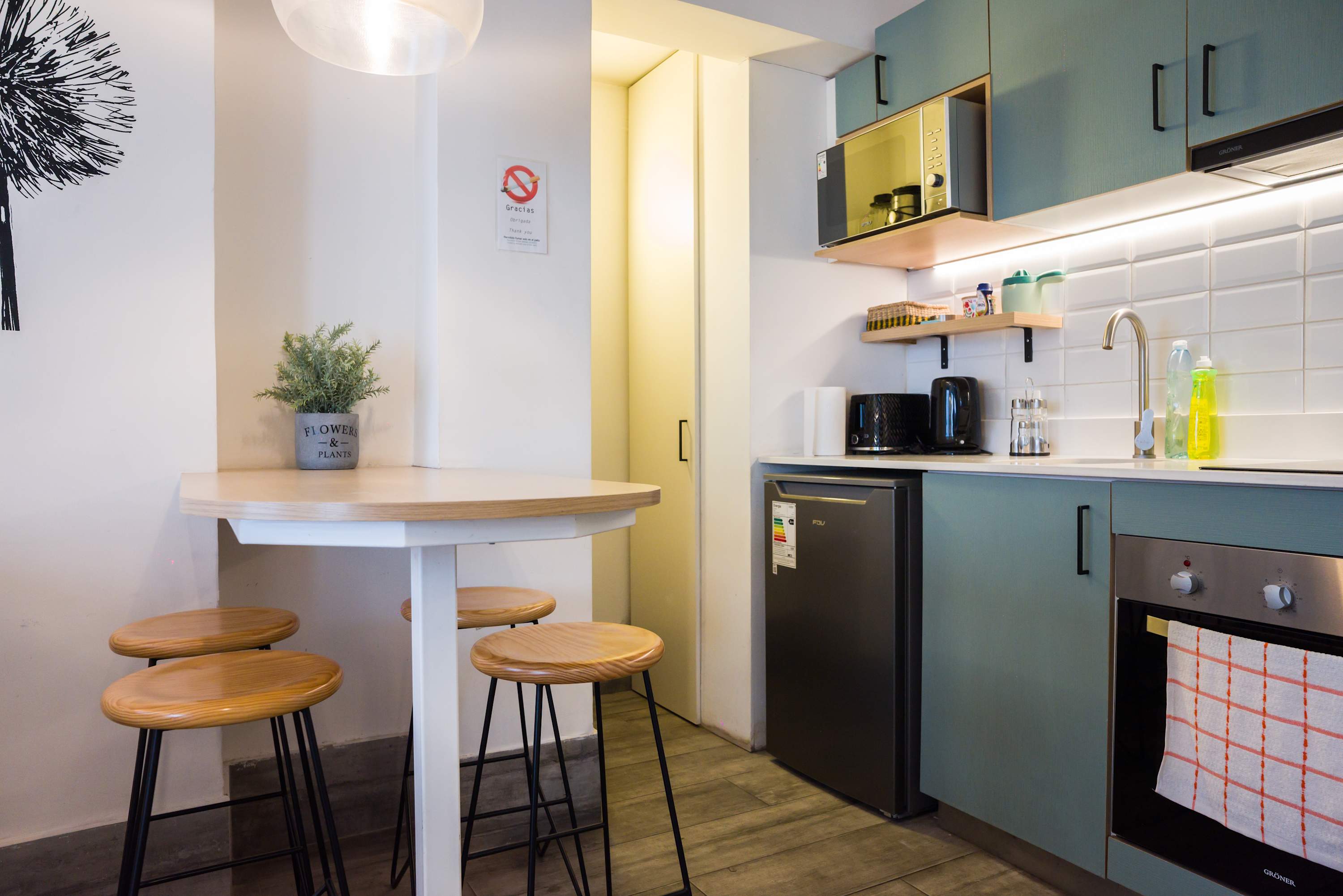 Cozy kitchen with modern amenities, perfect for preparing meals in a stylish setting.