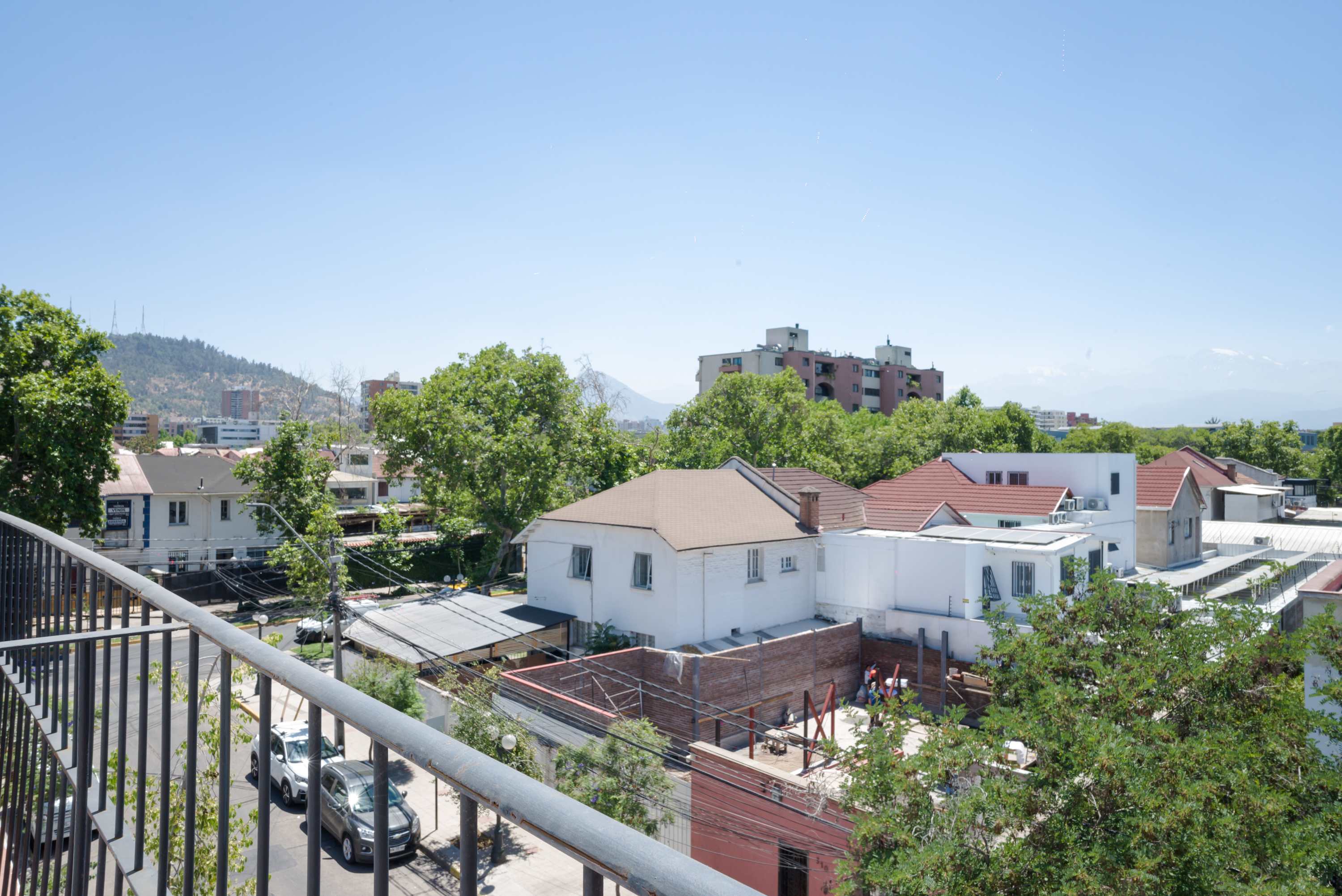 Enjoy stunning views of the cityscape and mountains from your private balcony, perfect for relaxing and unwinding.