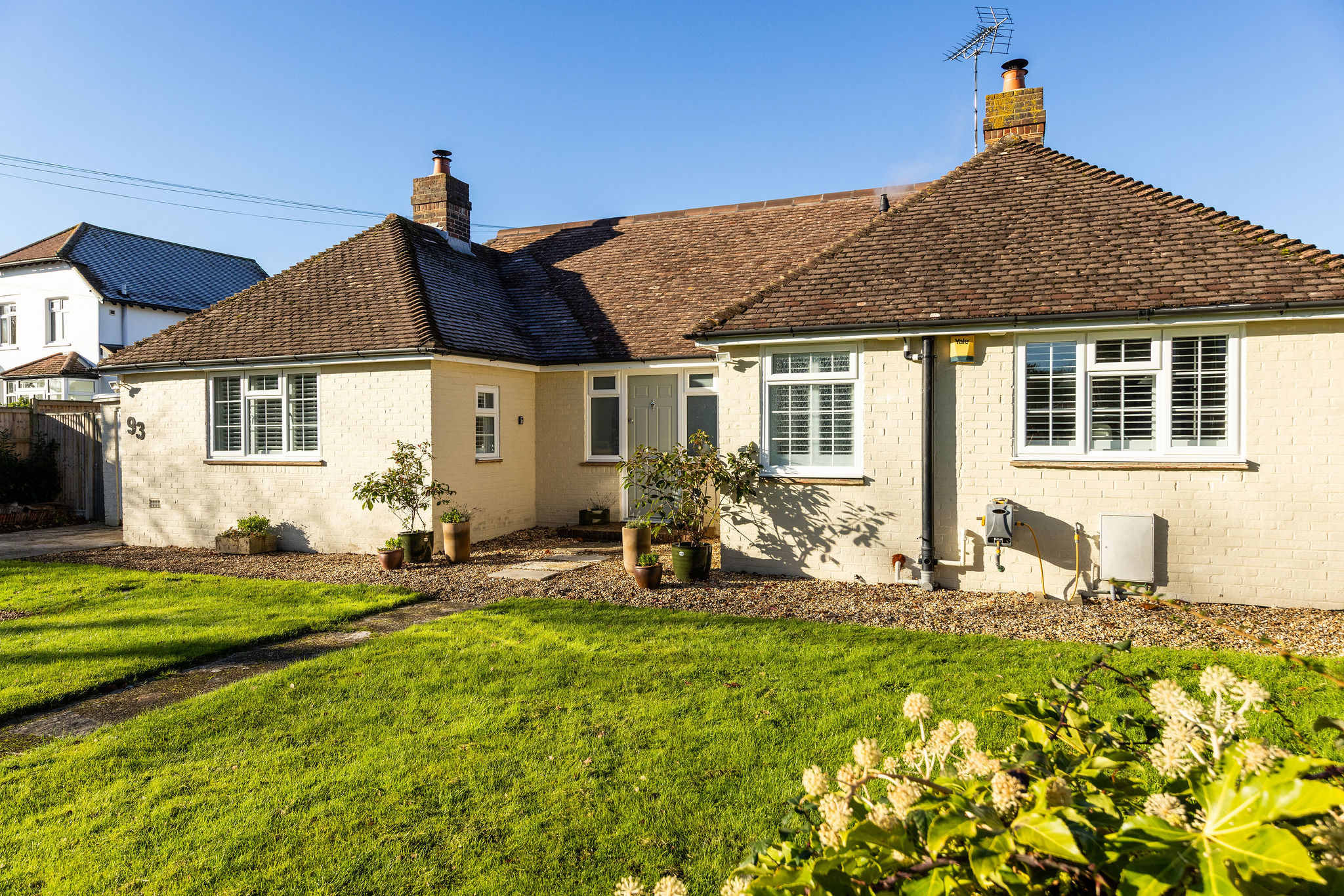 Green lawns and driveway parking for your stay