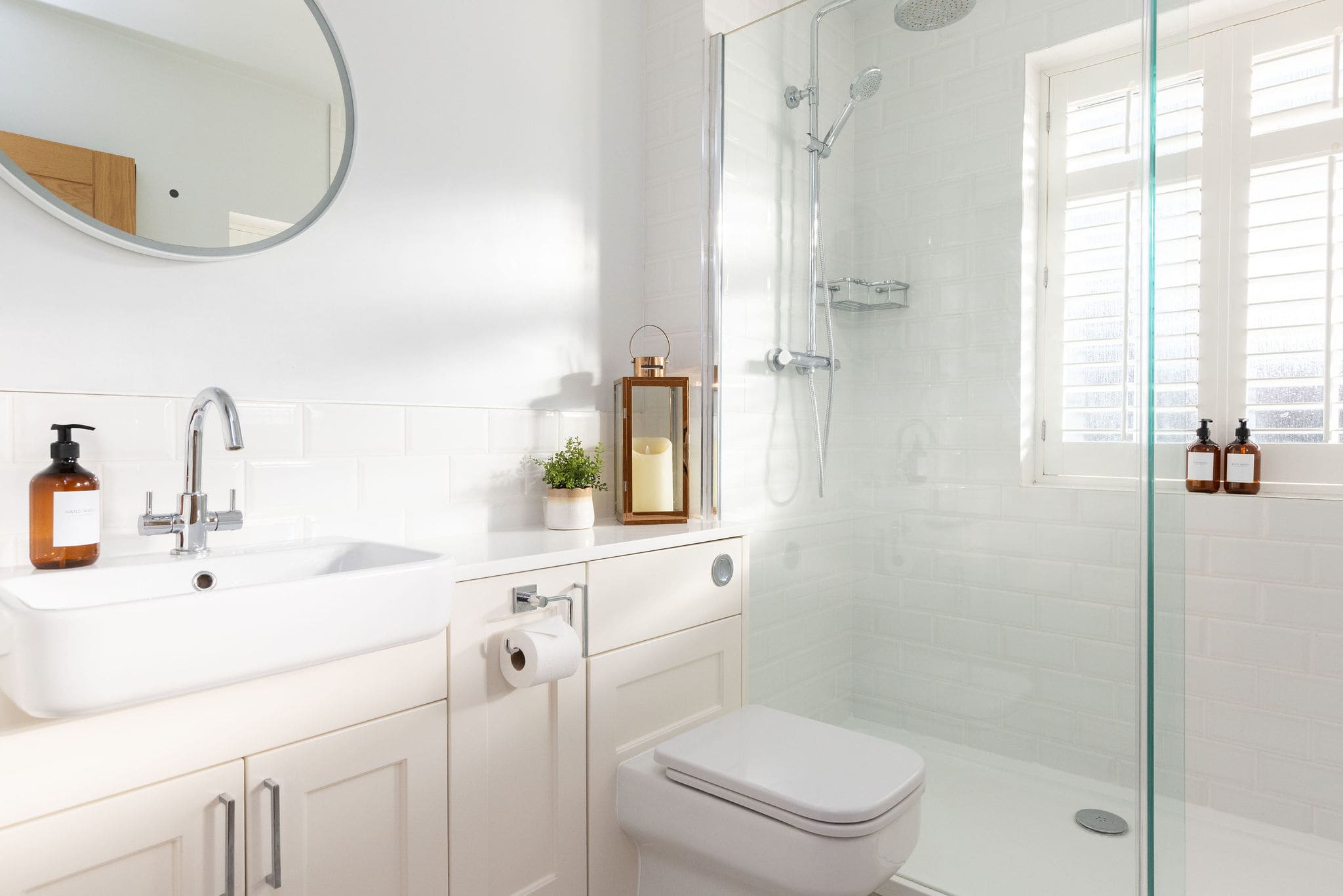 Sink, WC and overhead shower and bath can be found in the family bathroom
