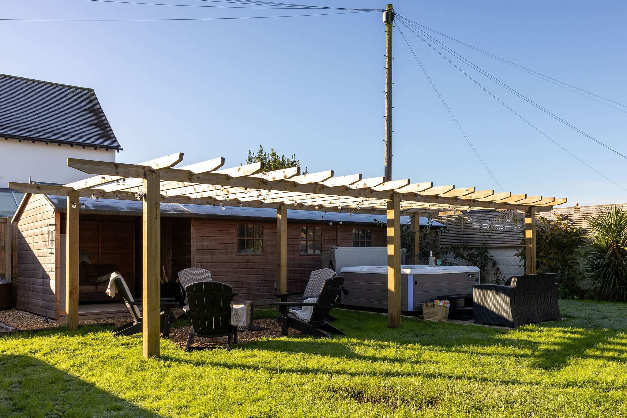 Head over the hot tub area, you will find more seating to relax