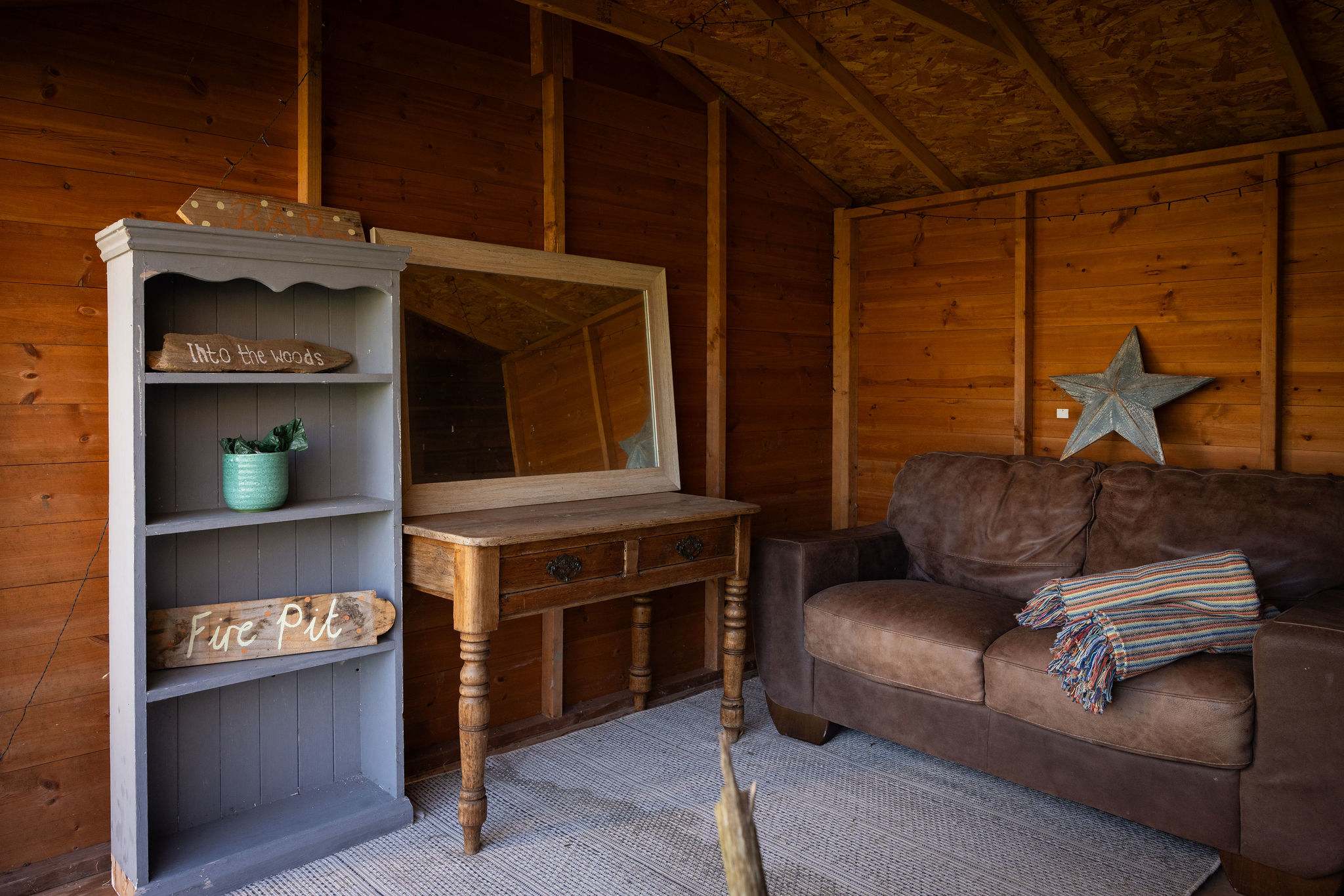 A small summer house with inside seating