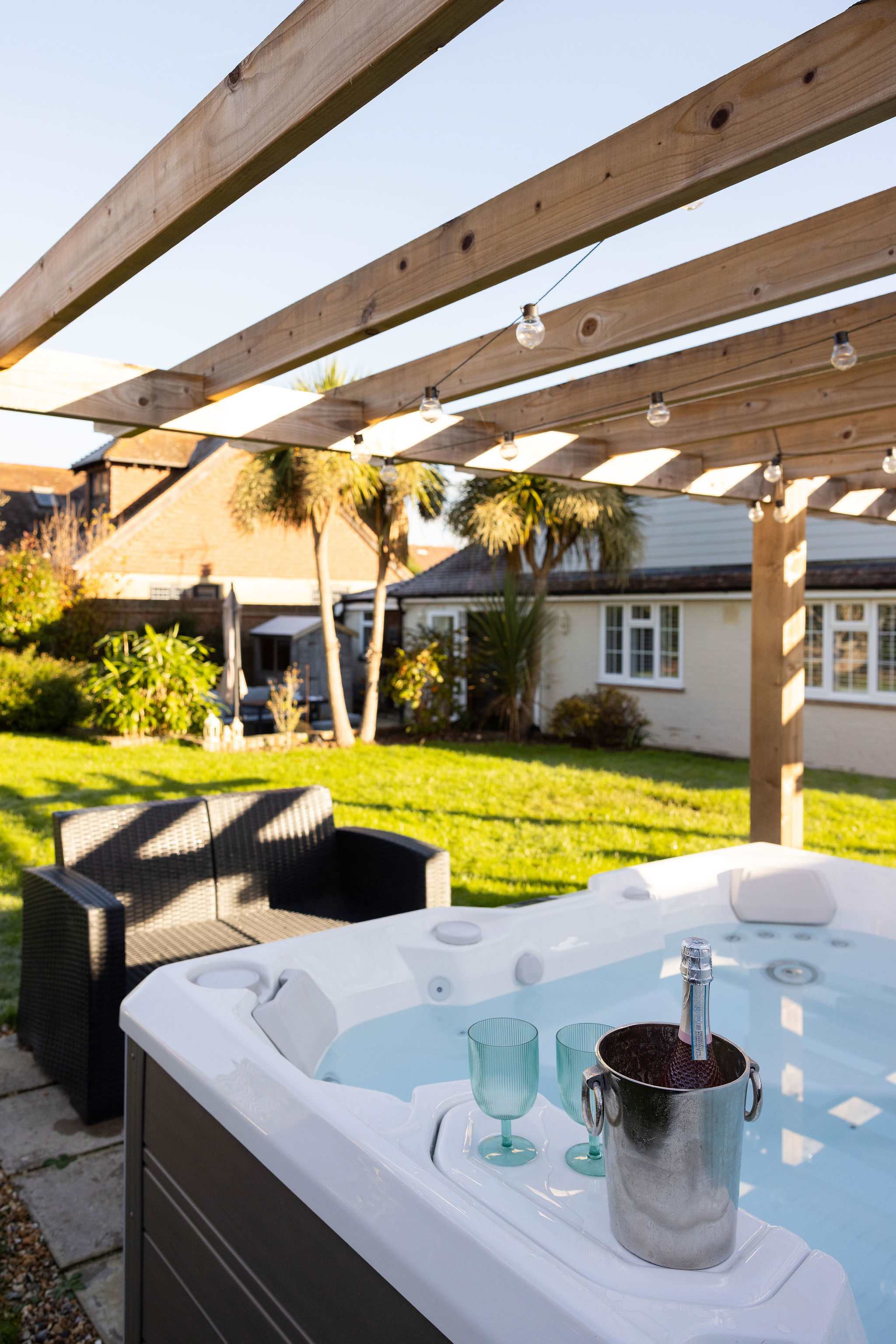 Private hot tub for ultimate relaxation (£150 surcharge).