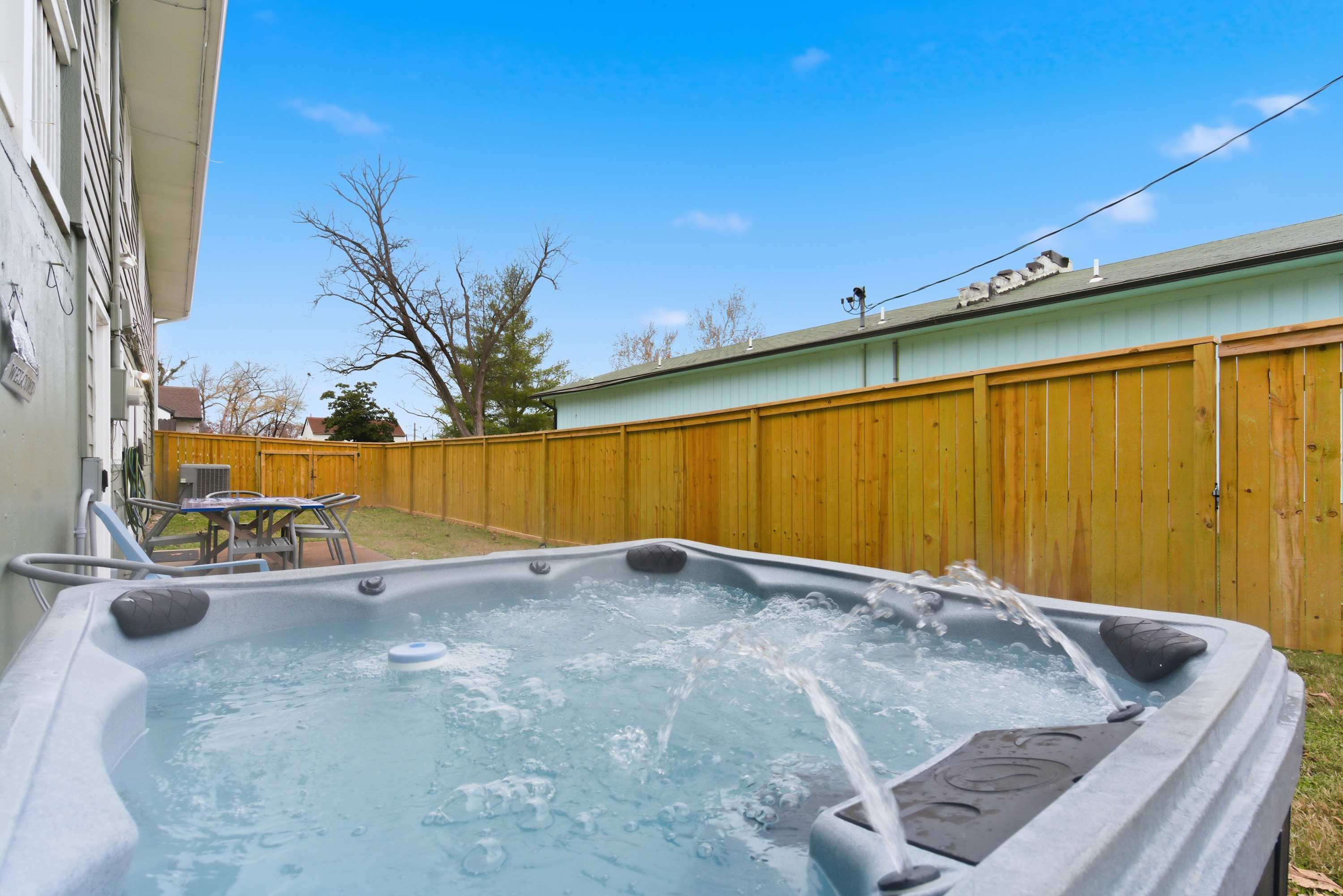 Gather outside by the hot tub