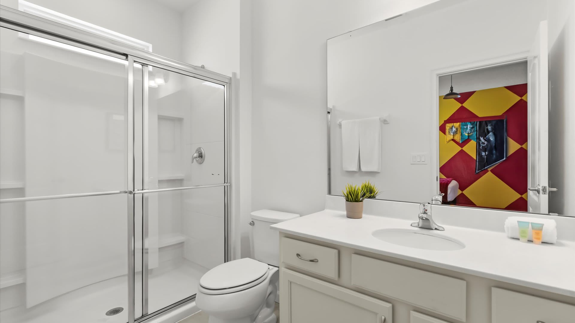 Bright bathroom with modern white finishes.
