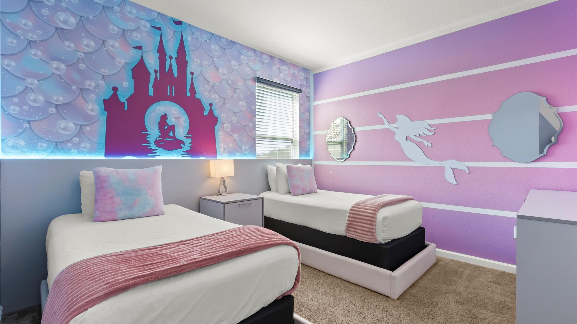 Magical pink princess-themed bedroom perfect for little guests.