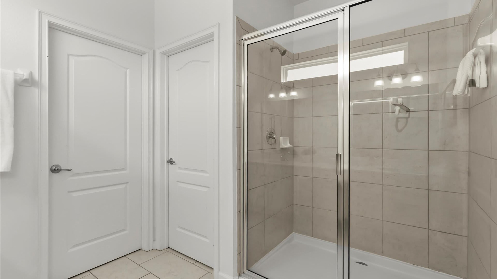 Ensuite bathroom with large standing shower.