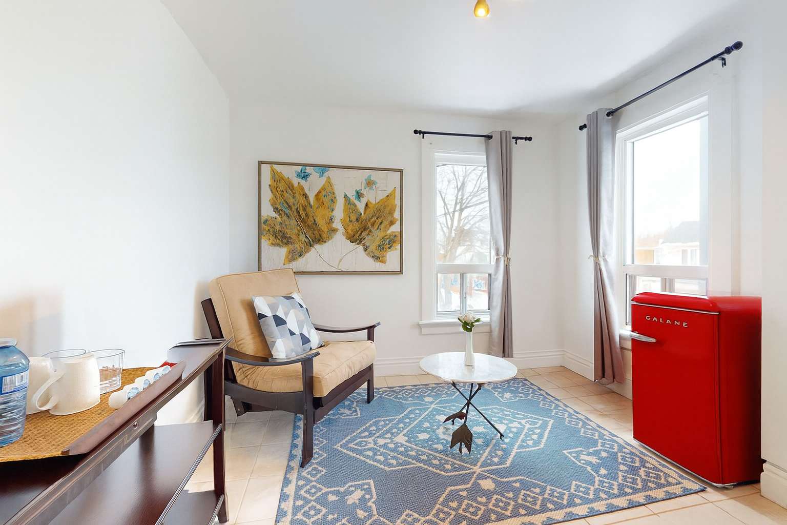 Relaxing Nook with Bar Fridge and Arm Chair