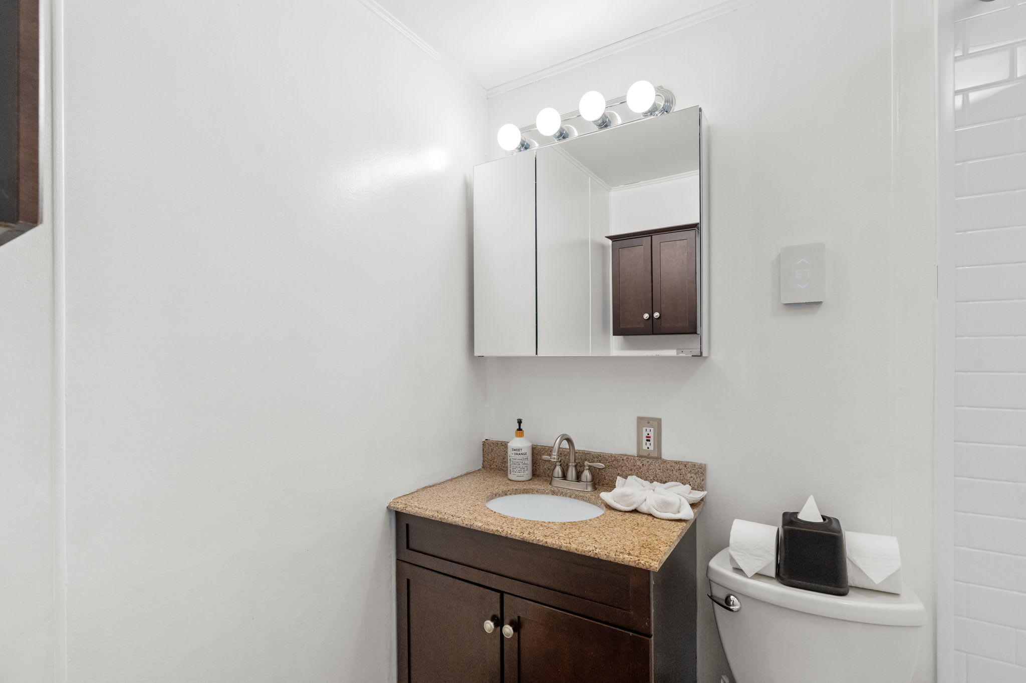 Full bathroom with bathtub and shower in Lake Naomi Pocono vacation cabin