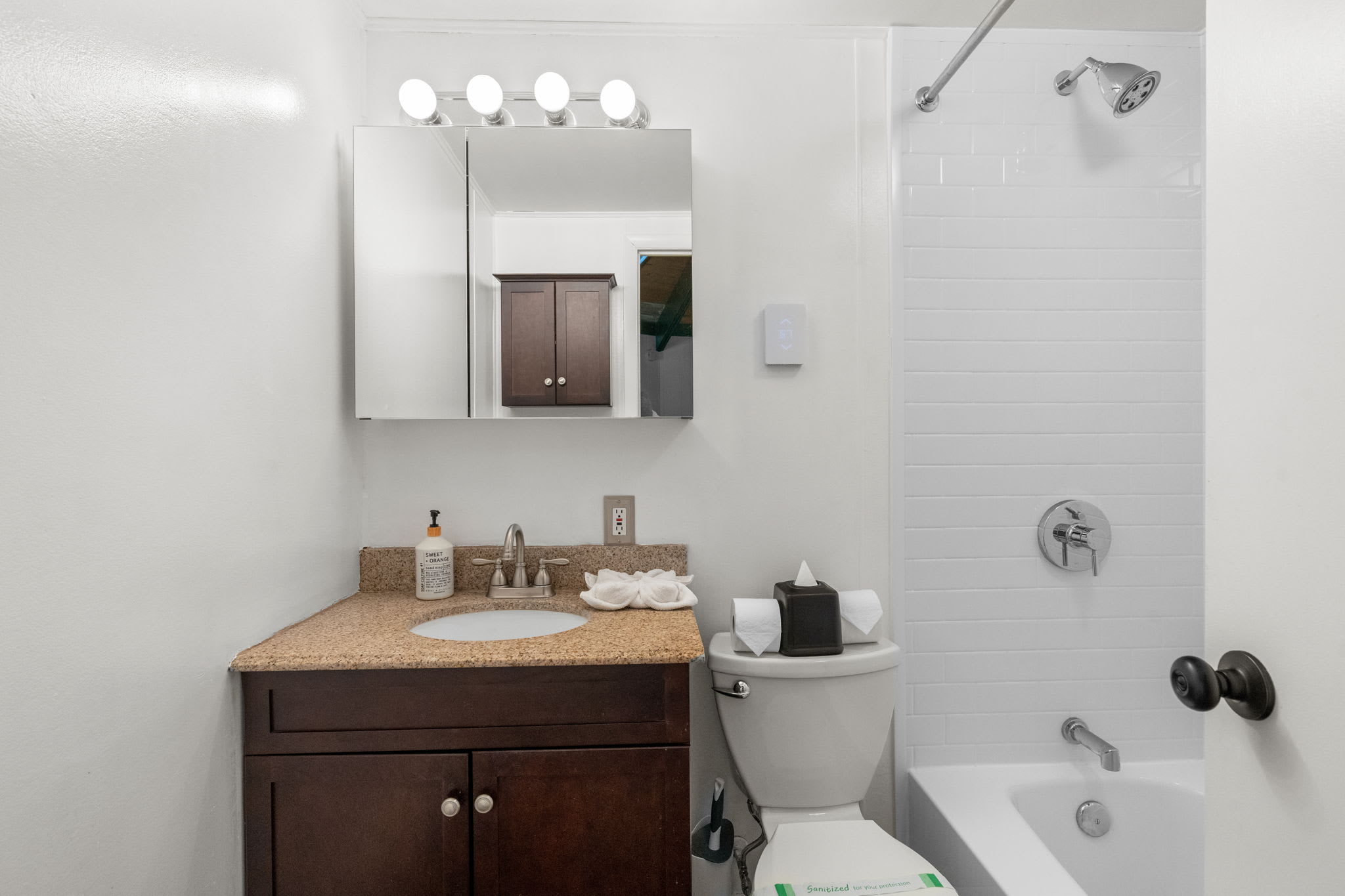 Clean bathroom with shower and modern amenities in Pocono Mountains cabin rental