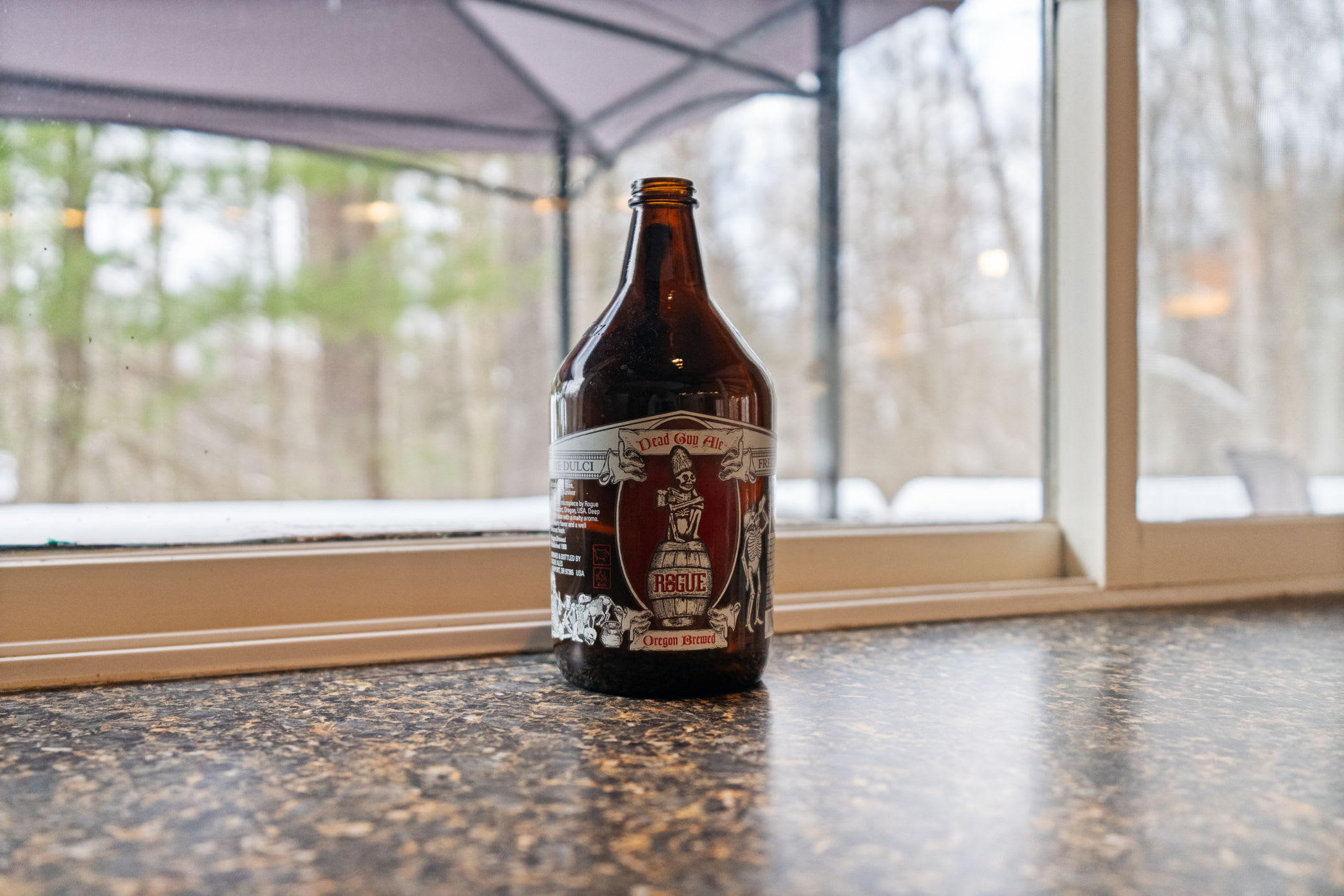 Relaxing window nook with serene forest views at Lake Naomi Pocono Mountains cabin