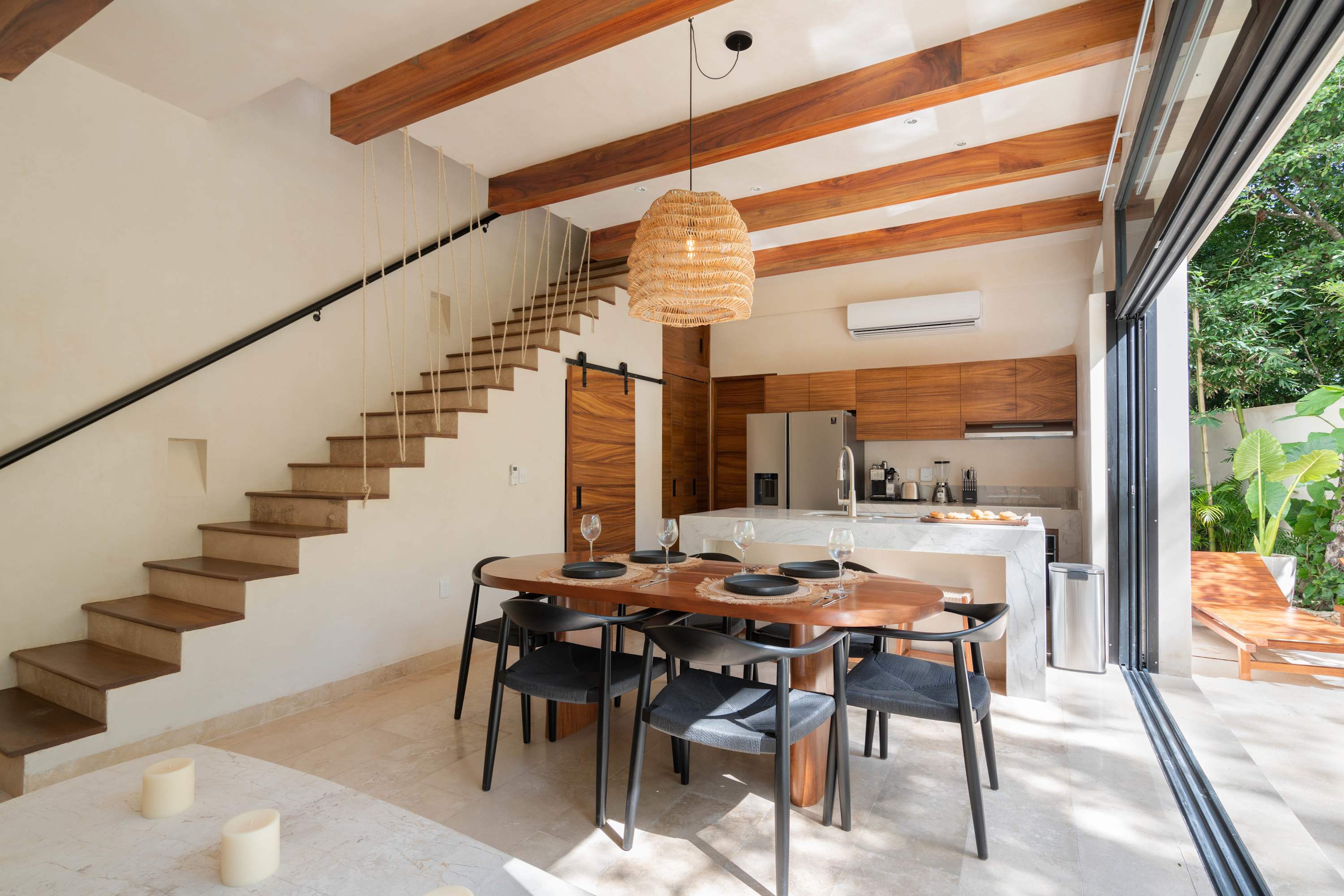 Incredible open-plan kitchen and dining area with a connection to the outdoor patio