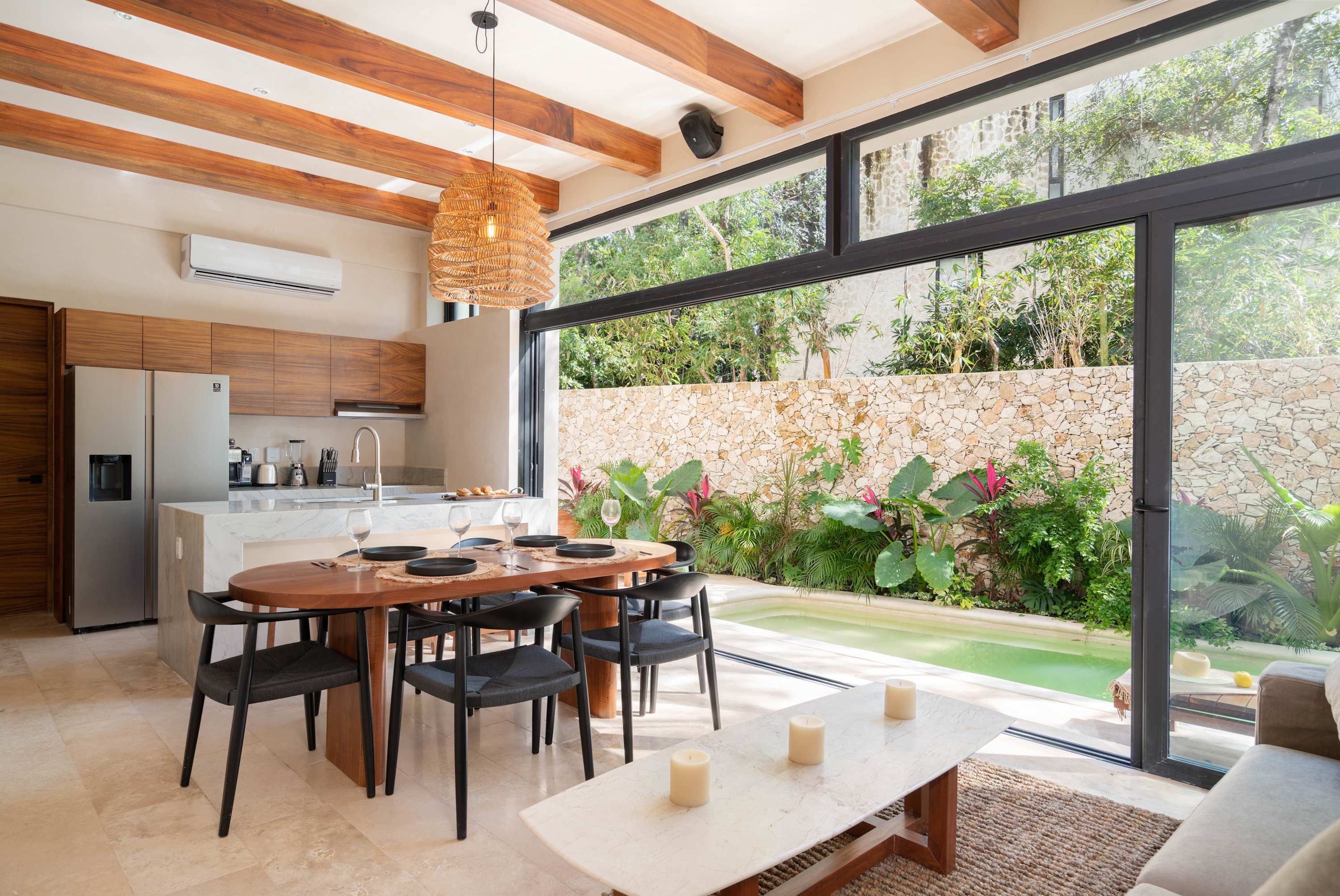 Incredible open-plan kitchen and dining area with a connection to the outdoor patio