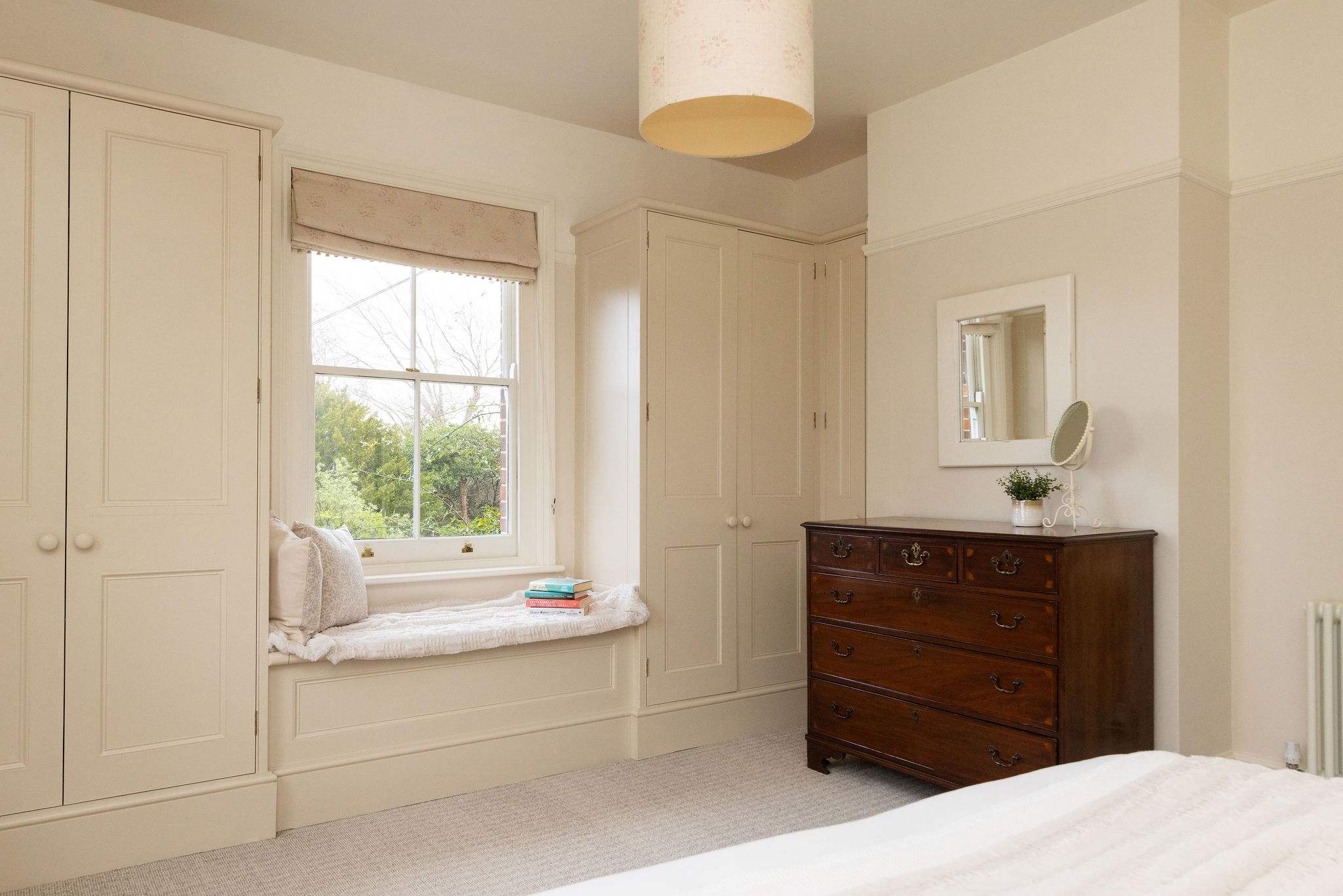 King Bedroom with window seat and storage