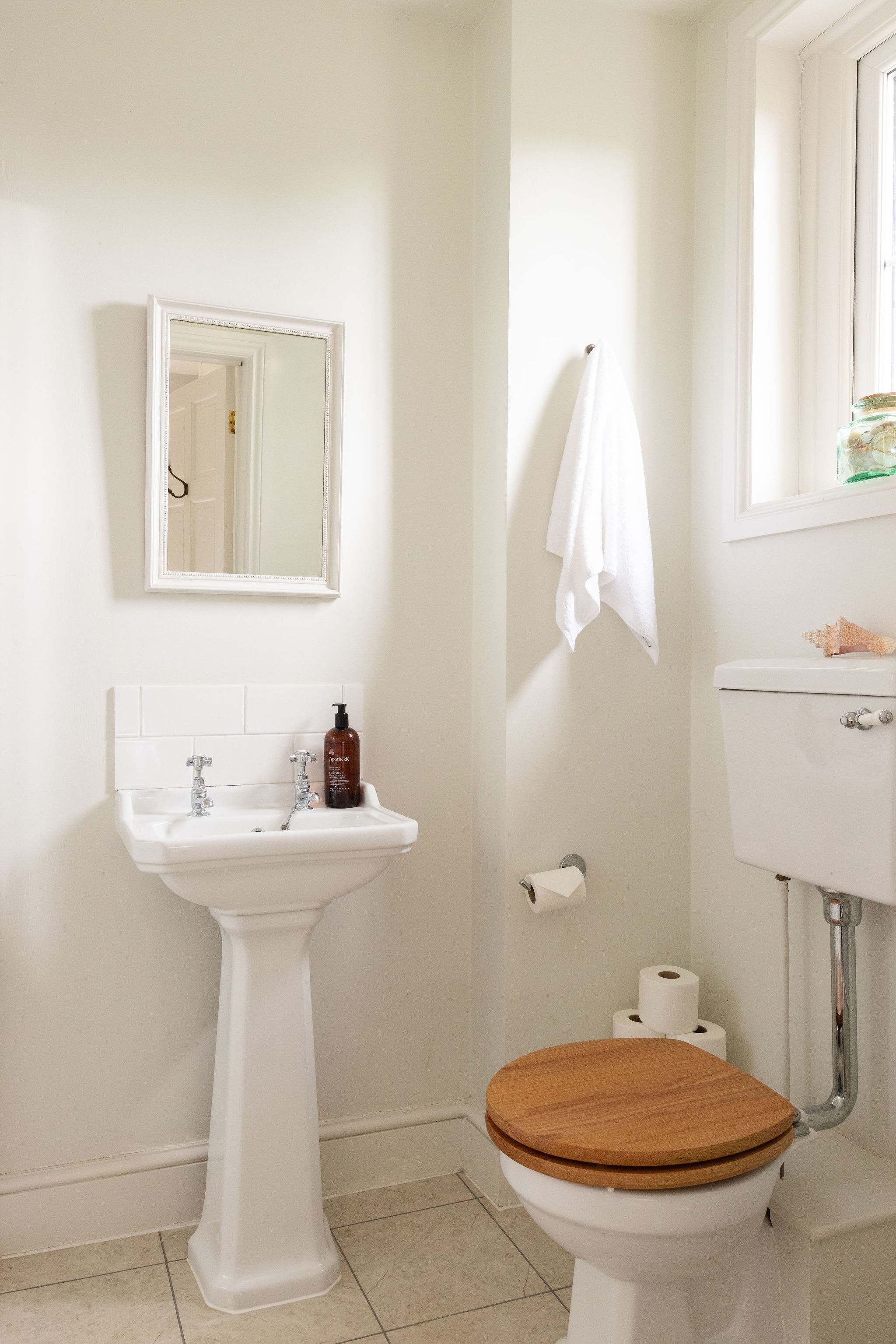 Compact en suite with shower, basin and WC