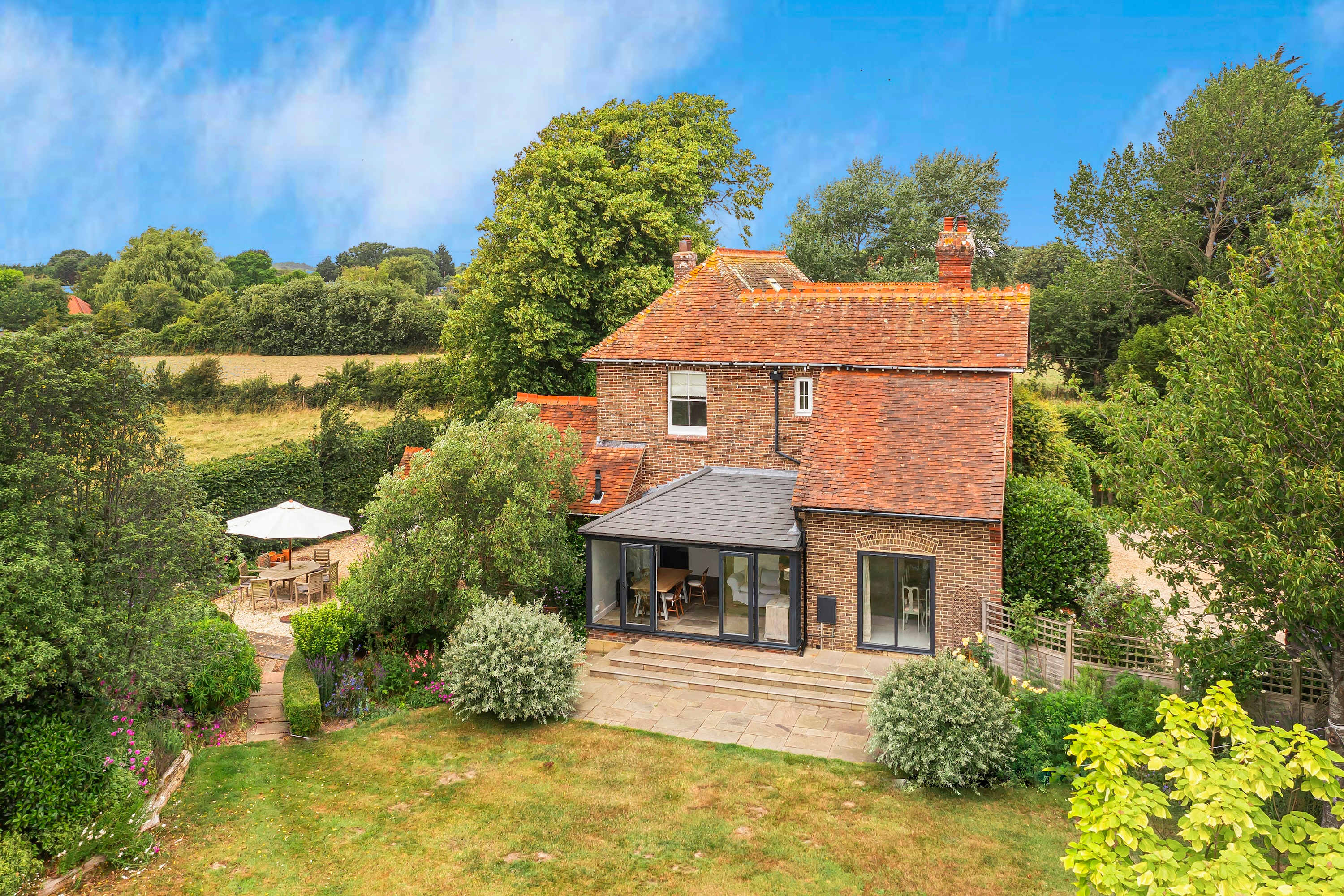 Doors open up from the kitchen/diner onto the garden area