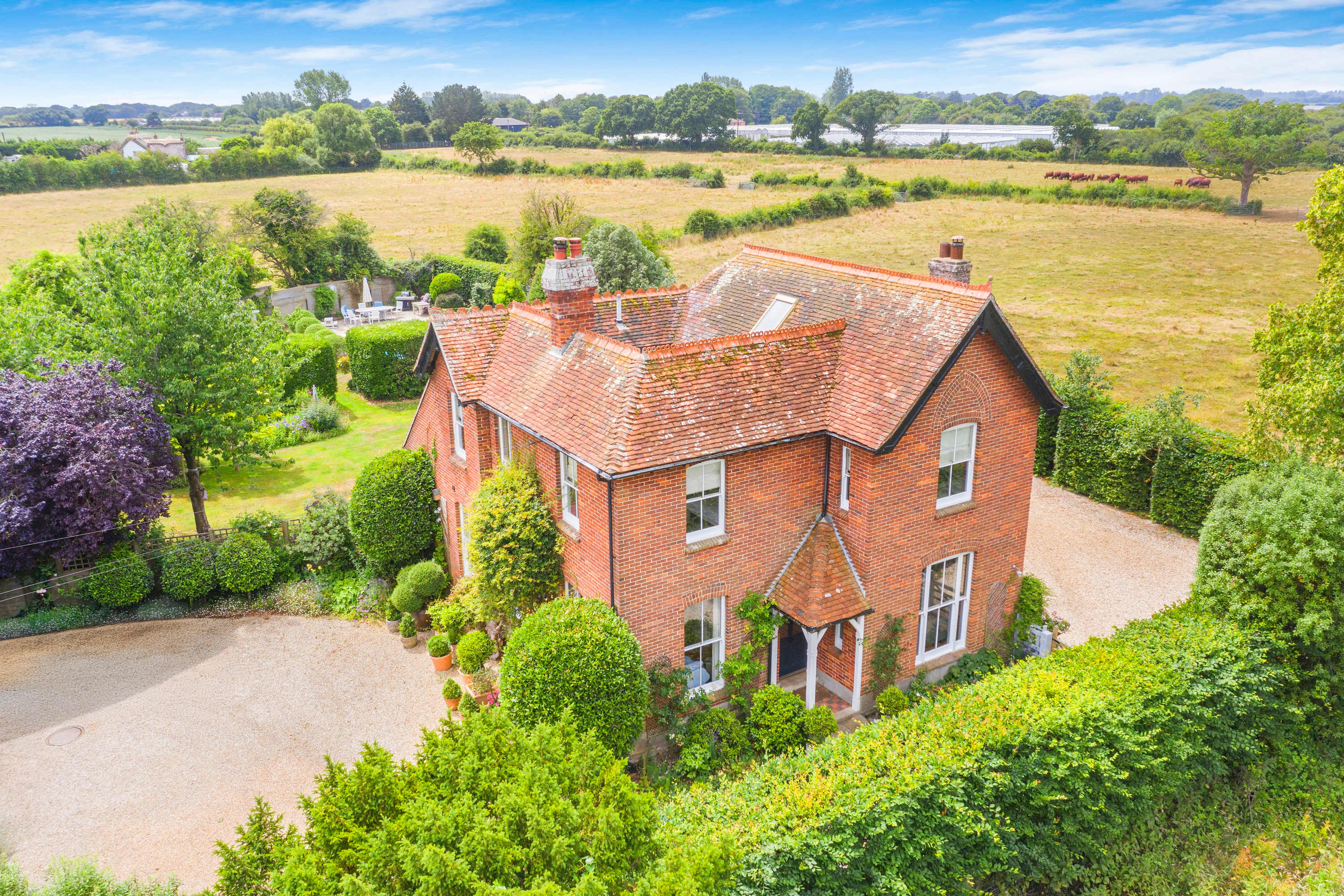 Aerial view of the house and gardens