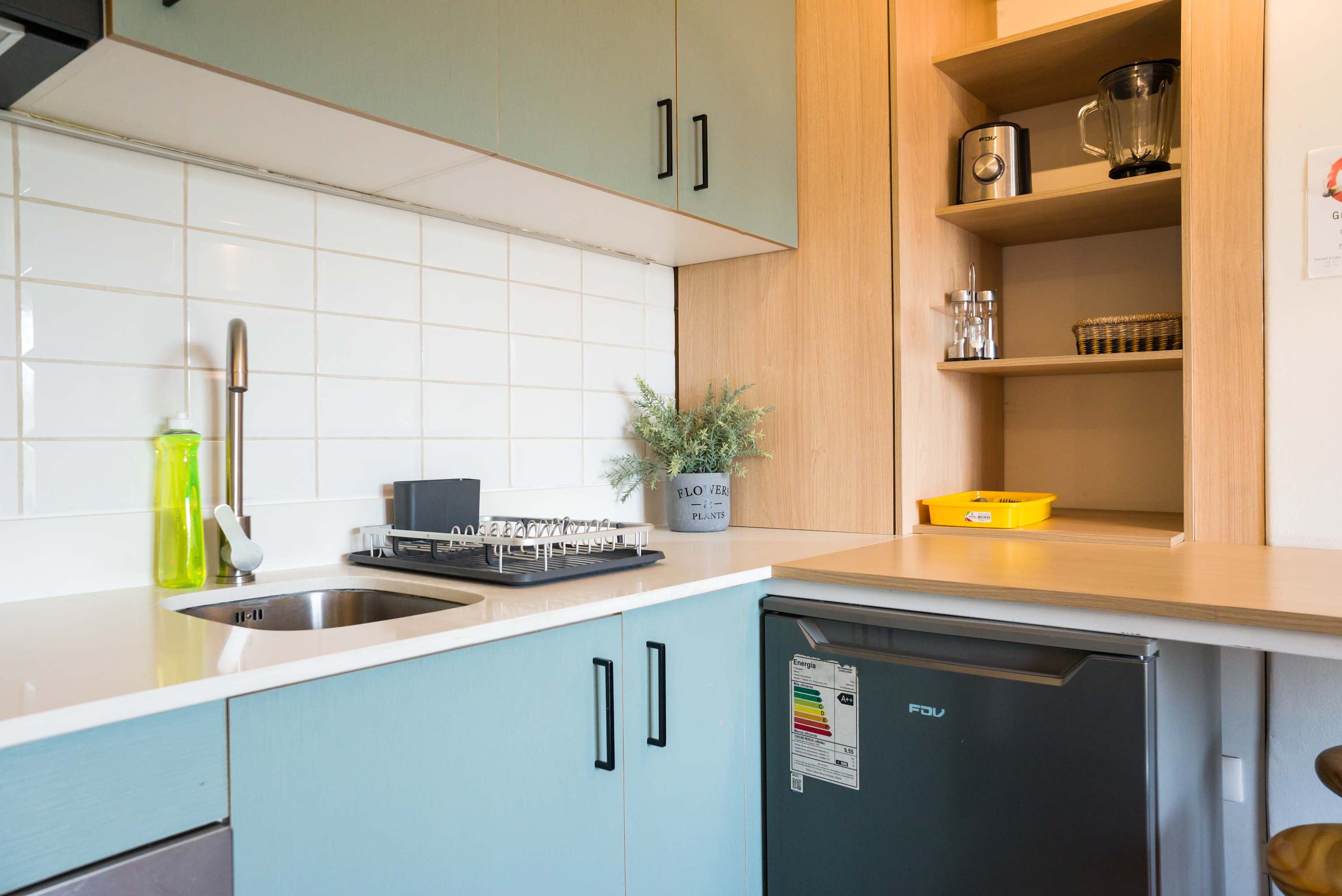 Modern and efficient kitchenette with all essentials for a comfortable stay in the heart of the city.