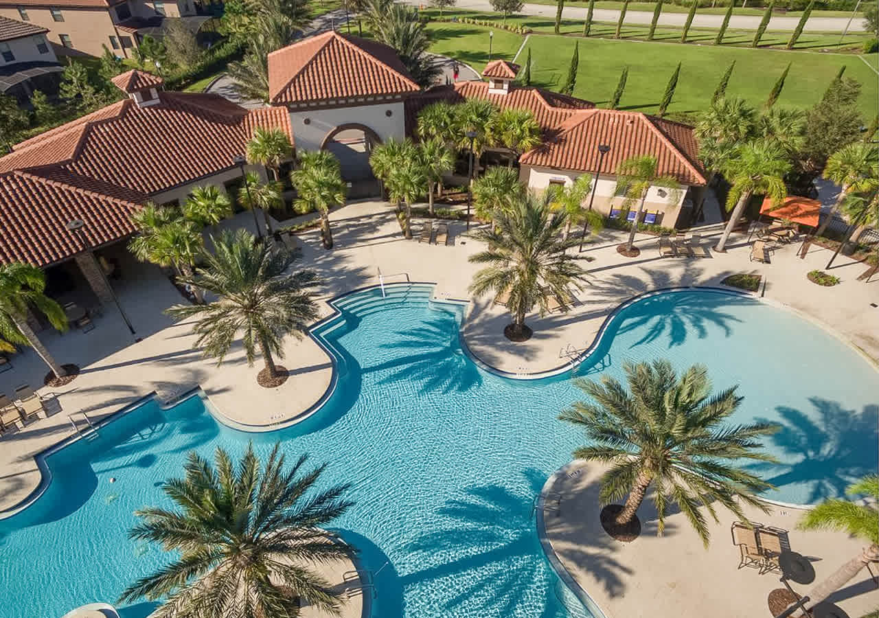 Solterra Resort pool surrounded by palm trees