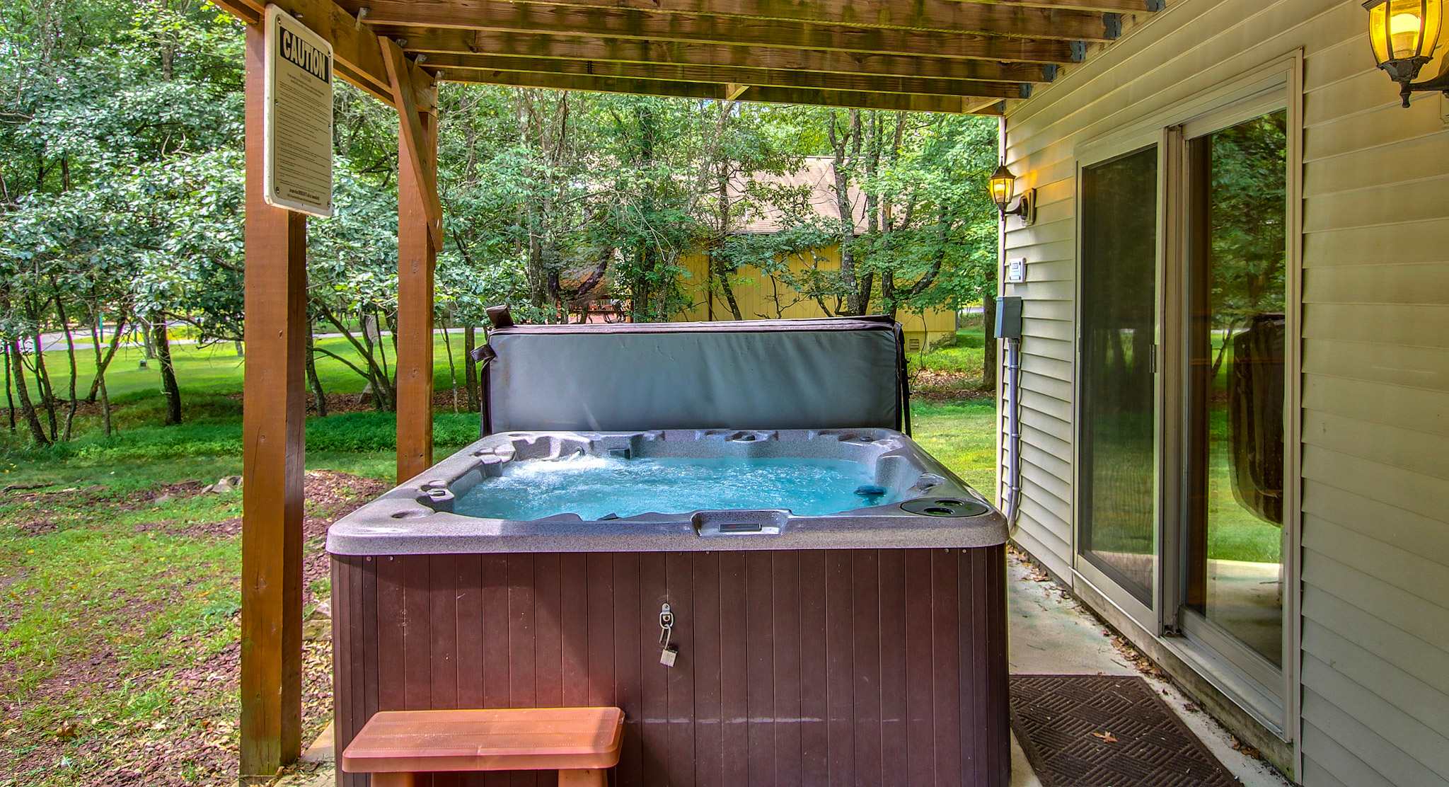 Soak and relax in the hot tub tucked beneath the spacious upper deck