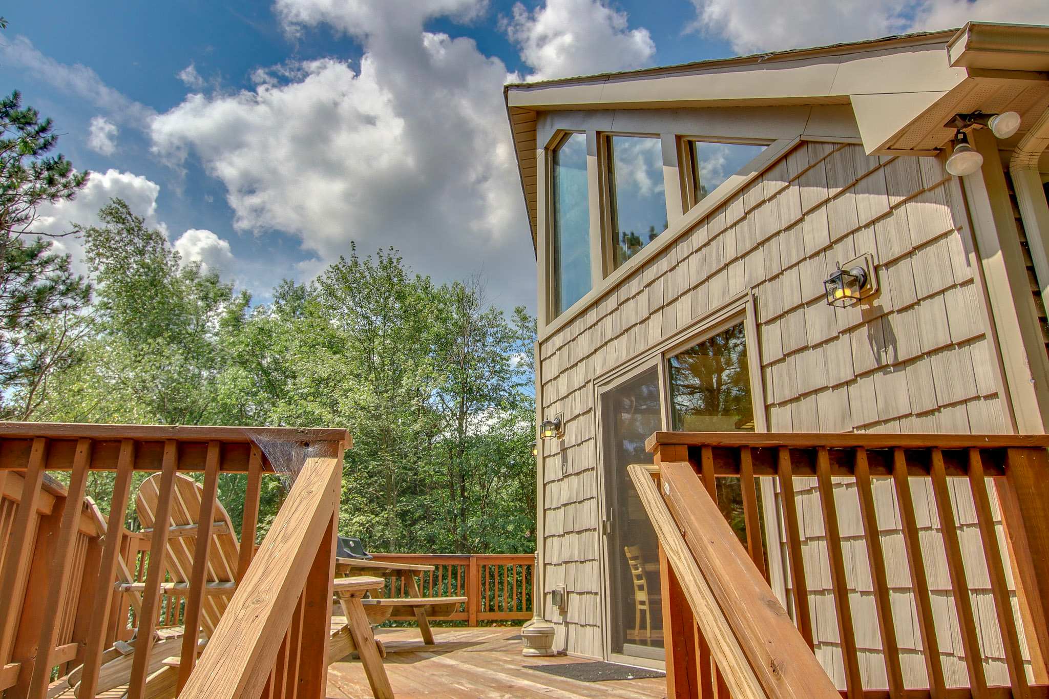 Dine al fresco at the picnic table or kick back in the Adirondack chairs on the deck