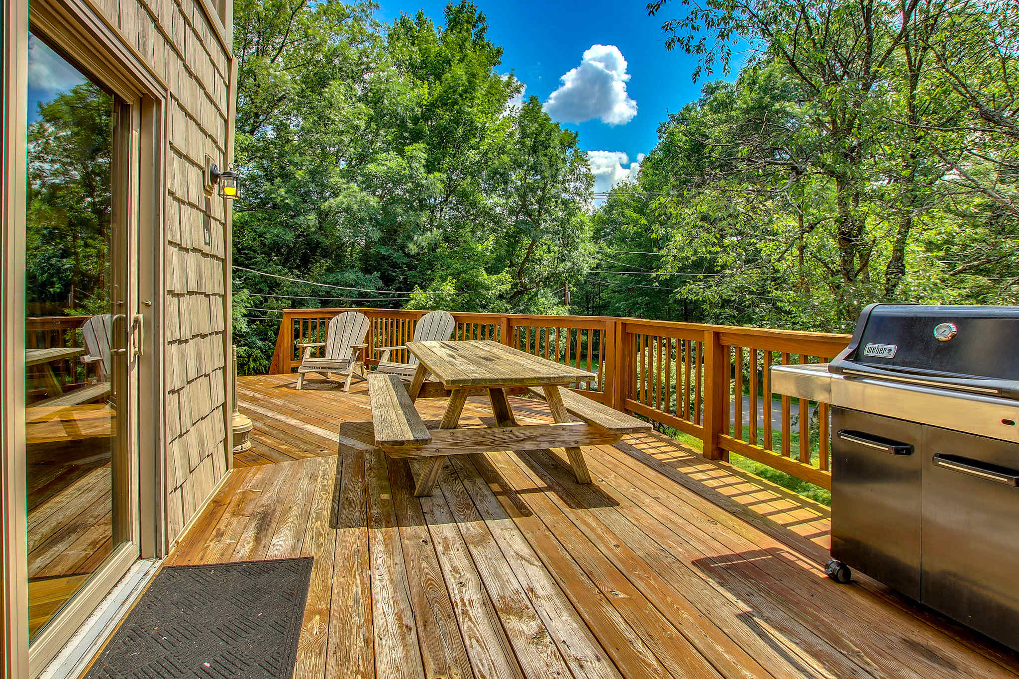 Fire up the grill and enjoy a cookout on the sun-drenched deck