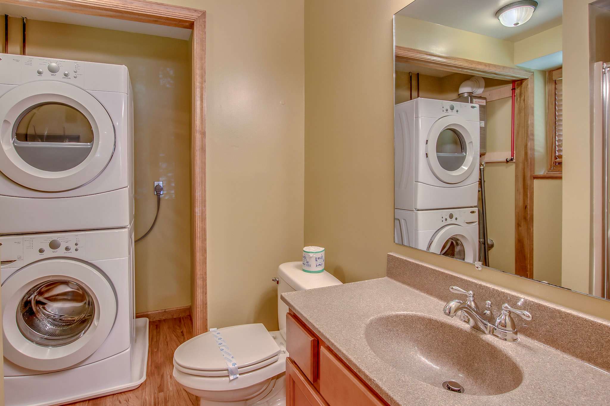 Convenience at your fingertips with in-unit laundry in the main floor bathroom
