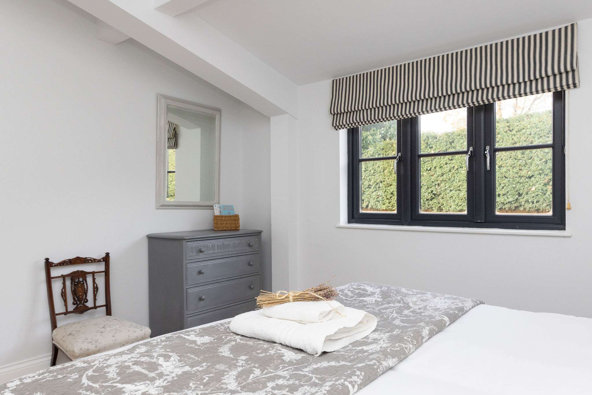 Bedroom with storage and natural light